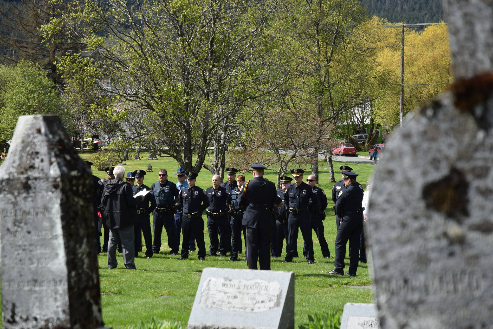 The Capital City Chapter of the Alaska Peace Officer Association hosted a wreath-laying at Evergreen Cemetery at noon Wednesday as part of its annual National Police Memorial Day ceremonies. (Liz Kellar | Juneau Empire)