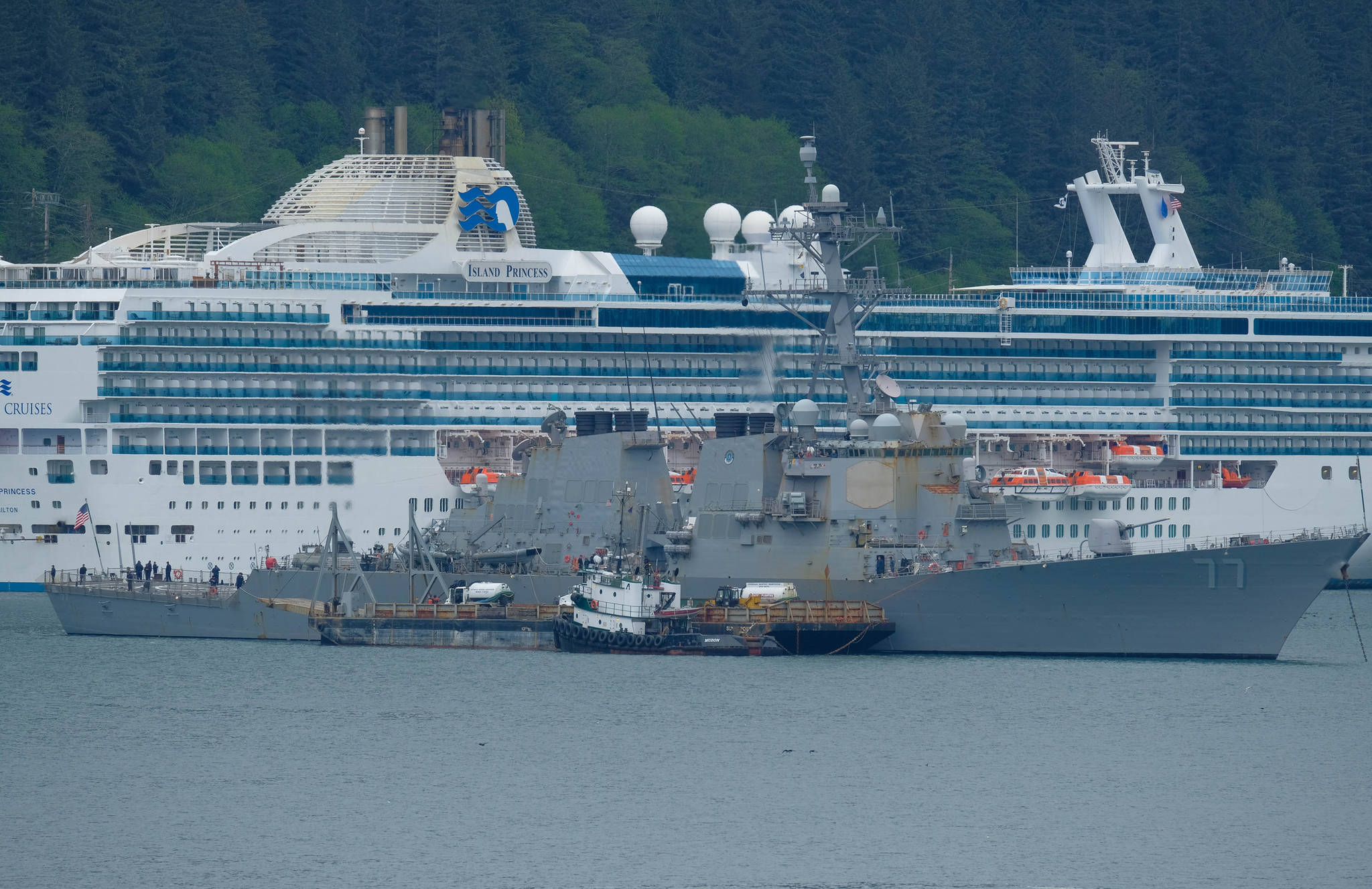 The 505-foot USS O’Kane anchors in front of a cruise ship in the Gastineau Channel on Saturday afternoon. (Lance Nesbitt | For the Juneau Empire)