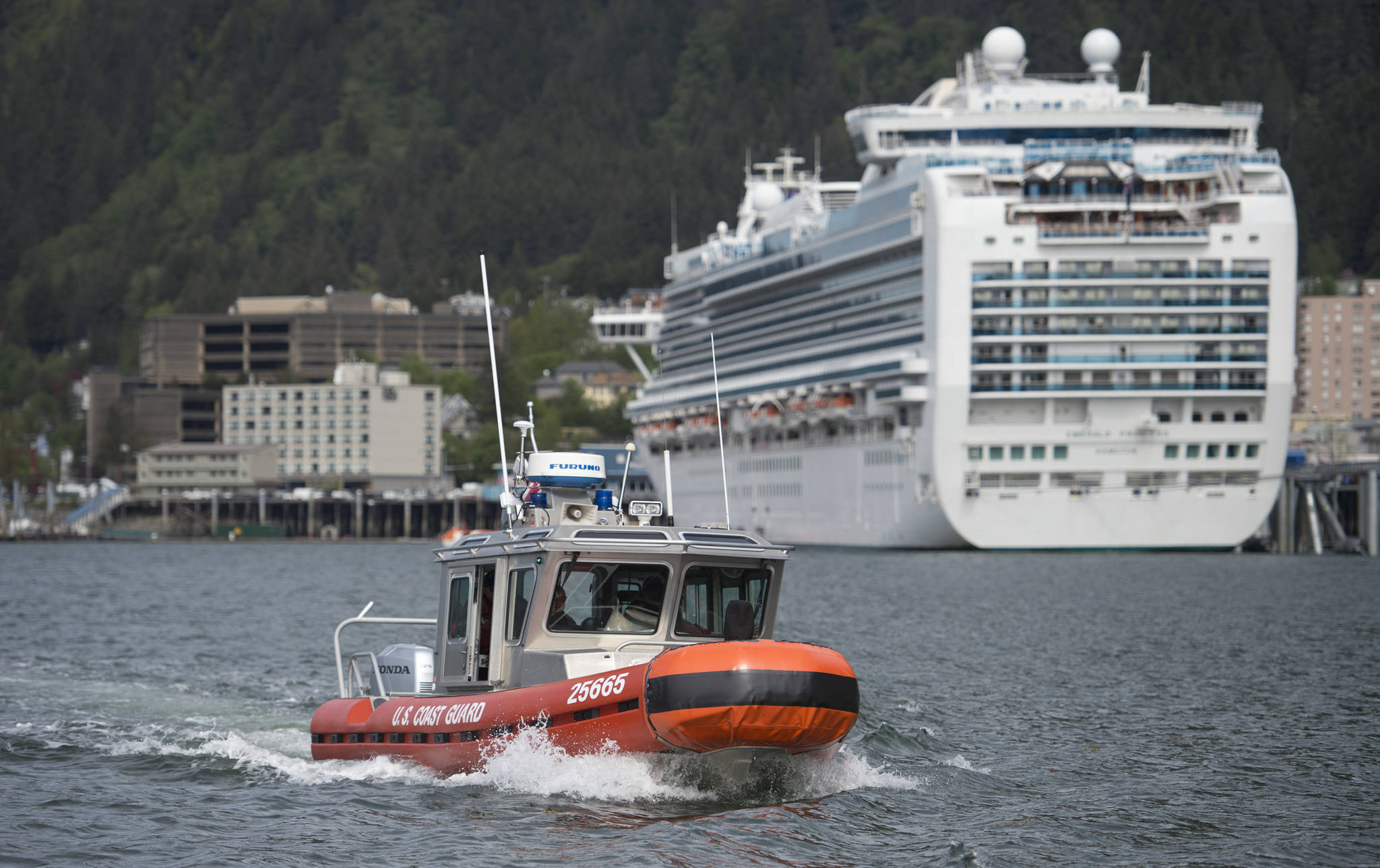 PHOTOS BY Michael Penn | Juneau Empire U.S. Coast Guard personnel aboard a 25-foot Response Boat conduct a Maritime Security Response operation in the Juneau harbor on Wednesday.