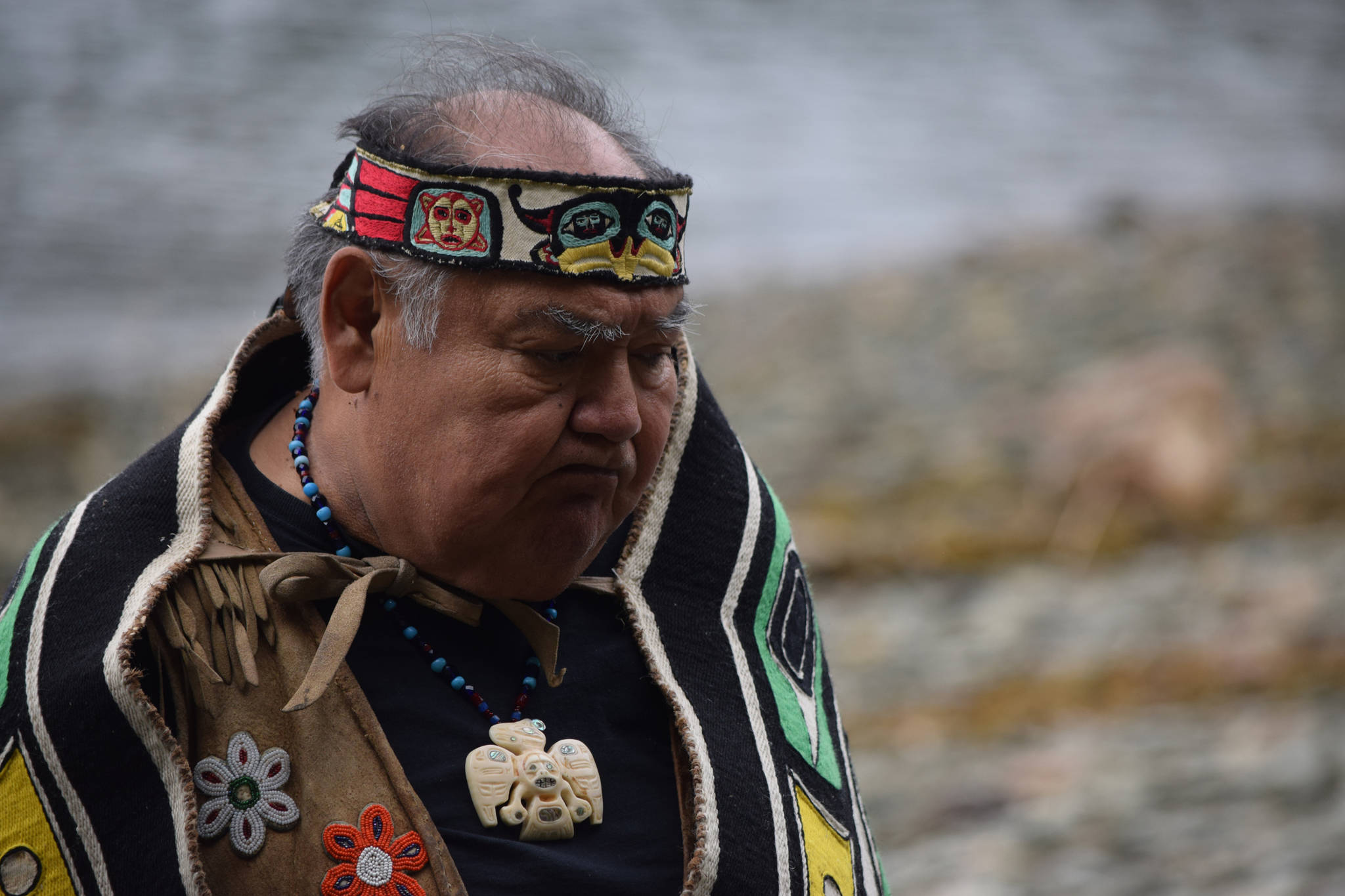 David Katzeek, a Tlingit leader, reflects at the site of a WWII internment camp for Aleut Alaska Natives. (Kevin Gullufsen | Juneau Empire)