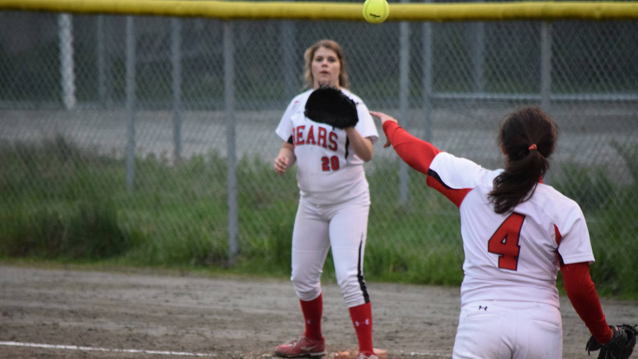 Juneau-Douglas High School pitcher Leah Spargo throws to Skylar Hickok on Thursday in the Region V softball tournament, Thursday, May 25. The Crimson Bears defeated Ketchikan 10-3. (Nolin Ainsworth | Juneau Empire)
