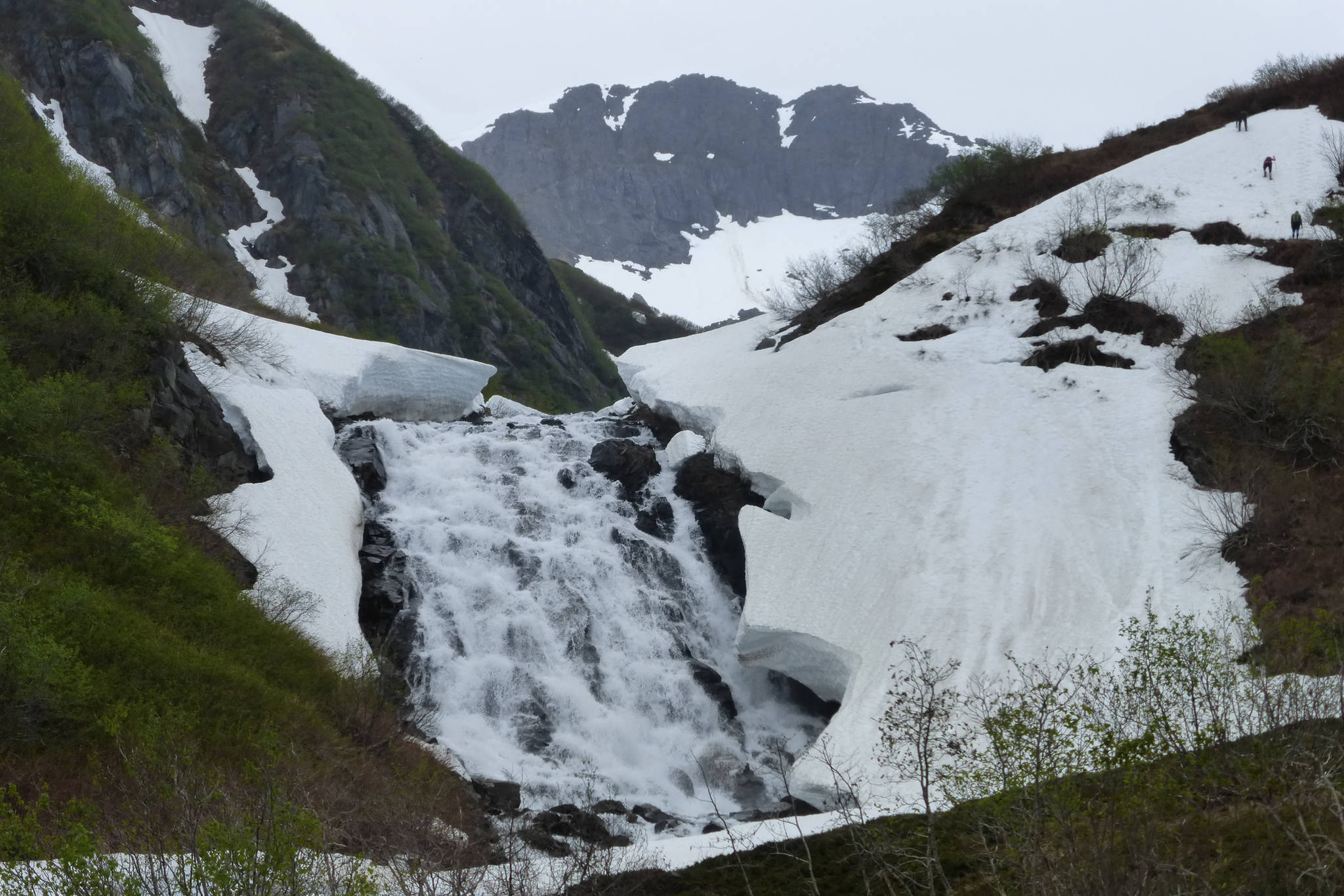 With Mt. Olds looking on, Granite Creek rushes down the valley at full force on May 31. (Photo by Denise Carroll)