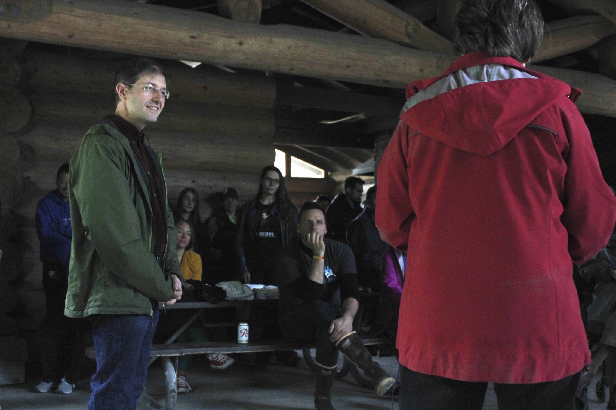 City and Borough of Juneau Assembly member Jesse Kiehl (left) listens as Sara Boesser talks about her mother Mildred&rsquo;s LGBTQ advocacy. Kiehl accepted the Mildred Boesser Equal Rights Award on Sunday, being selected for his efforts on Juneau&rsquo;s equal rights ordinance. (Alex McCarthy | Juneau Empire)