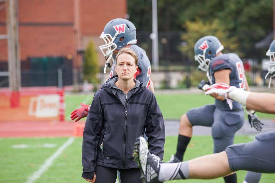 Cori Metzgar runs warmups at a Western Oregon University football practice. Metzgar has been with the Wolves since 2011. (Photo courtesy of Cori Metzgar)