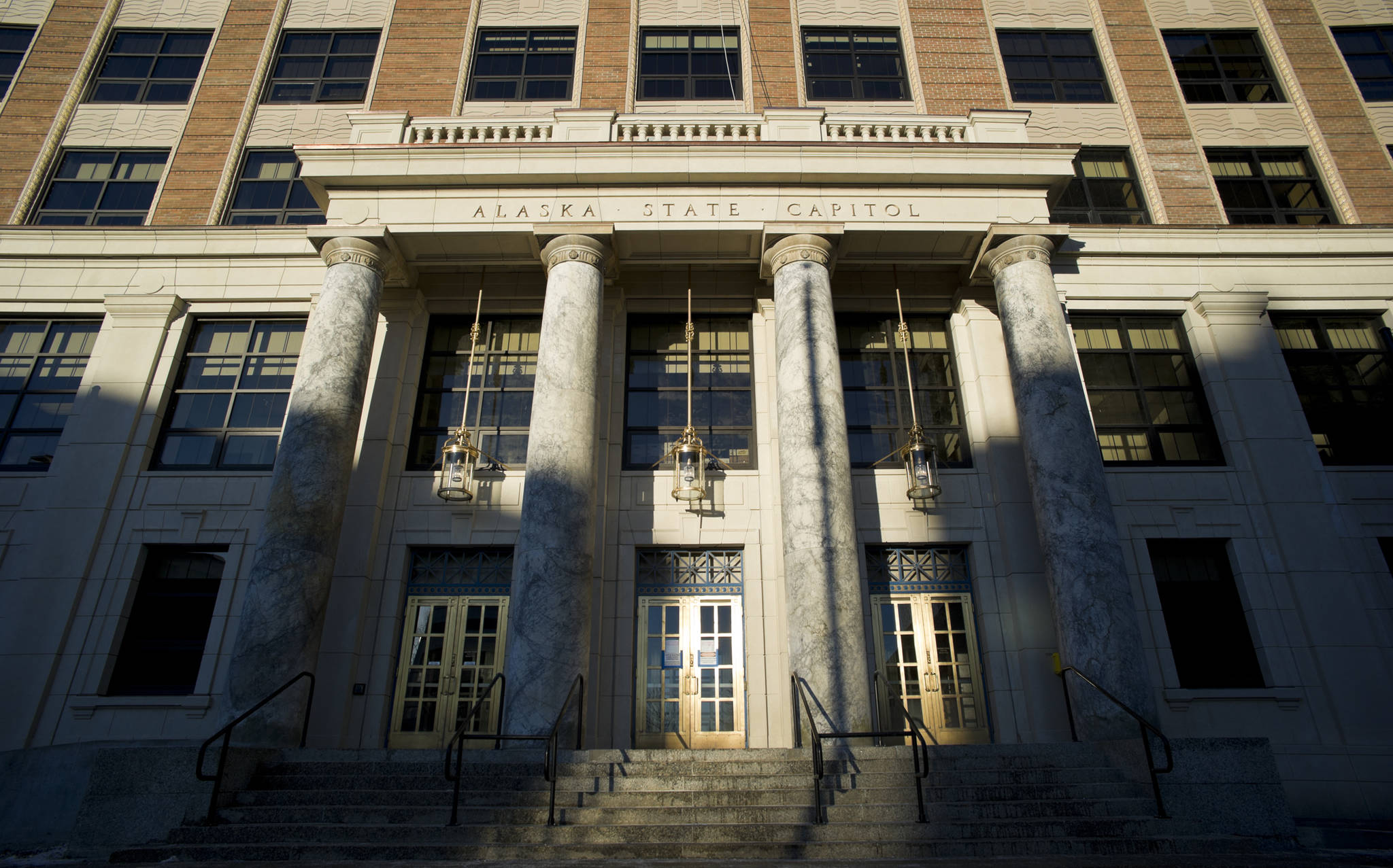 Sunlight exposes the front of the Alaska State Capitol building on Tuesday, Jan. 3, 2017. (Michael Penn | Juneau Empire)