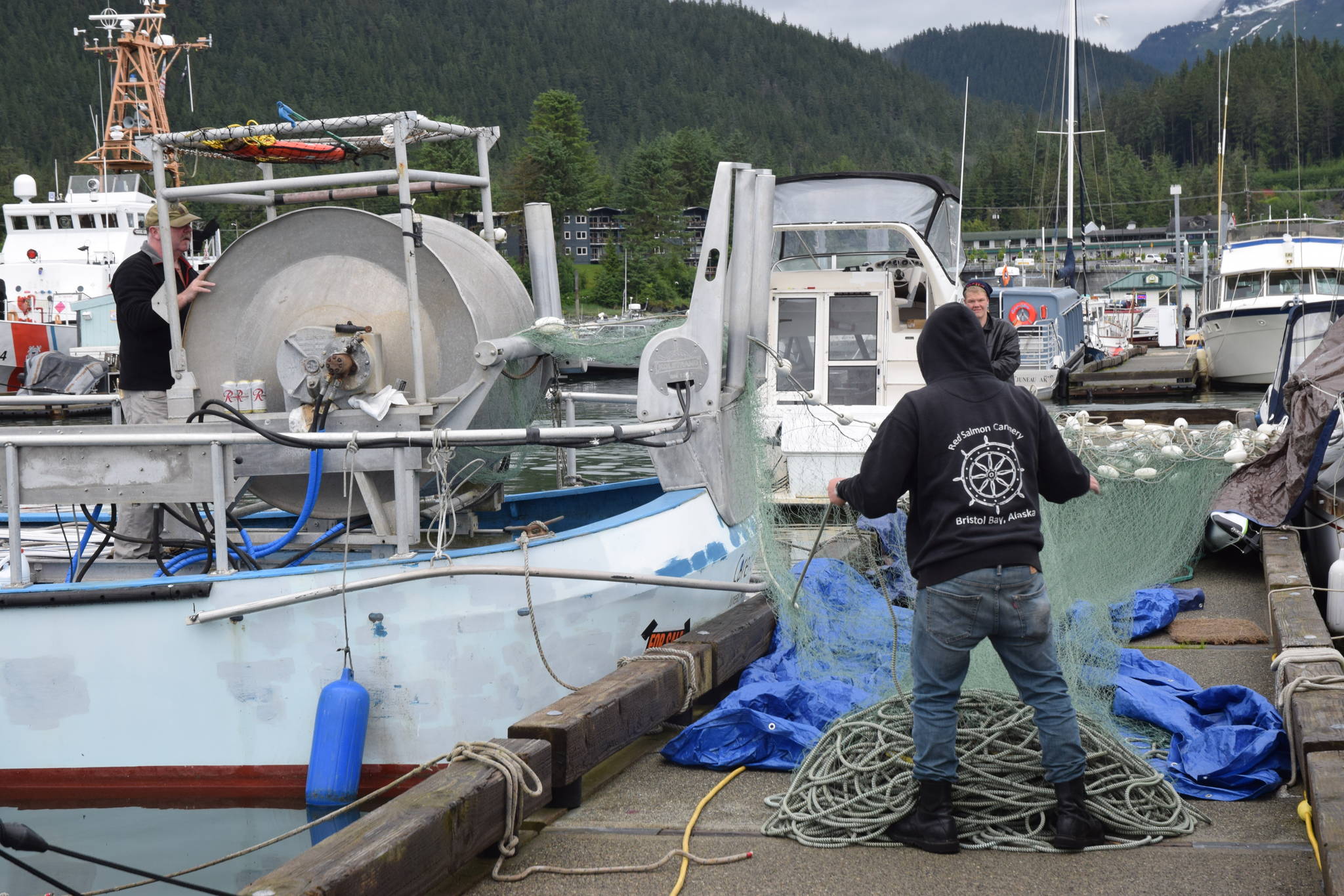 Dave Meiners goes through his gillnet in preparation for the first opening of the year for Juneau gillnetters. (Kevin Gullufsen | Juneau Empire)
