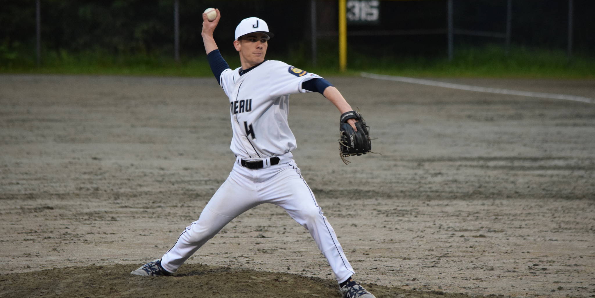 Juneau Post 25’s Chandler Lewis pitches against Wasilla Post 35 on Friday. Lewis faced nine batters in the sixth and seventh innings and didn’t give up a hit. (Nolin Ainsworth | Juneau Empire)