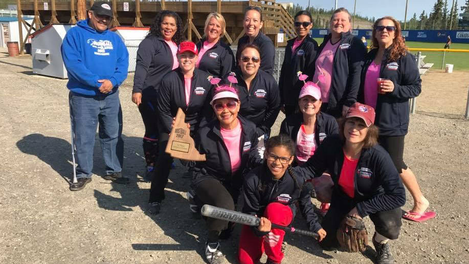 Frontier Gifts poses with their first place plaque after winning Dustball Invitational Slo-pitch Tournament, Women’s B division. Top row (l to r): Assistant coach Mike Lopez, Dany Reyes, Celeste Lopez, Hilary Martin, Eliana Jenkins, Toi Gile, Gina Chalcroft. Middle row: Robyn Ramos, Briana Lopez. Bottom row: Linda Taylor, coach Ginny Martin, Jodie Pessolano and Hadid Polanco (bat girl). (Photo courtesy of Ginny Martin)