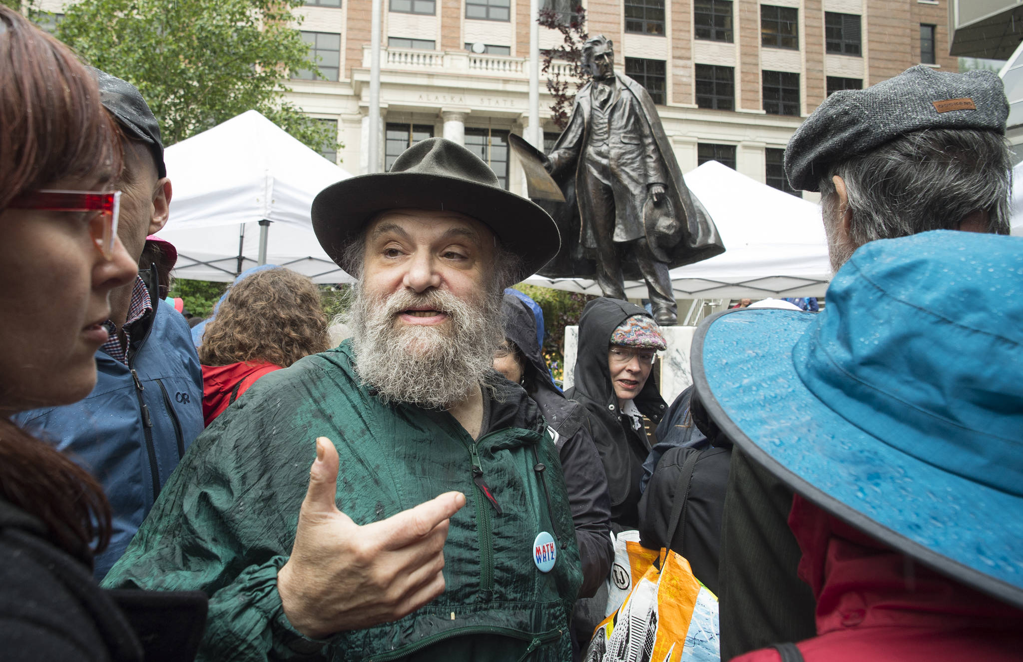 Dave Rubin, of Ketchikan, talks about the bronze statue of William Seward he designed and made with his sister, Judy, after an unveiling ceremony in the Dimond Courthouse Plaza on Monday, July 3, 2017. (Michael Penn | Juneau Empire)