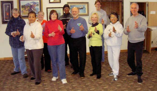 In this 2014 file photo, Tai Chi students strike a Tai Chi pose at a class put on by Southeast Senior Services. (Juneau Empire file)