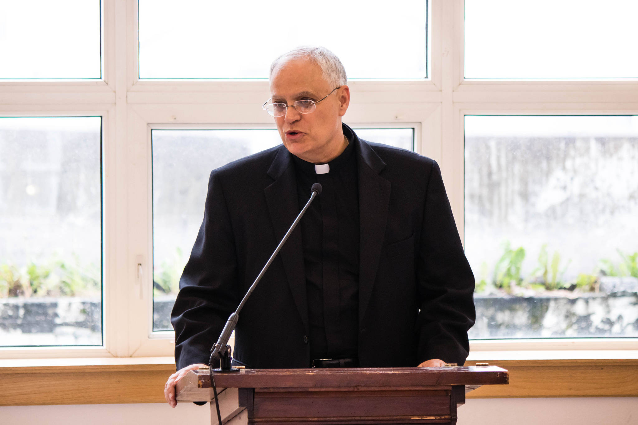 Bishop-elect Father Andrew Bellisario addresses parishioners and media members at a Tuesday press conference. Bellisario has been appointed the next bishop of the Diocese of Juneau, and starts in October. (Photo courtesy of Christine Johnson)