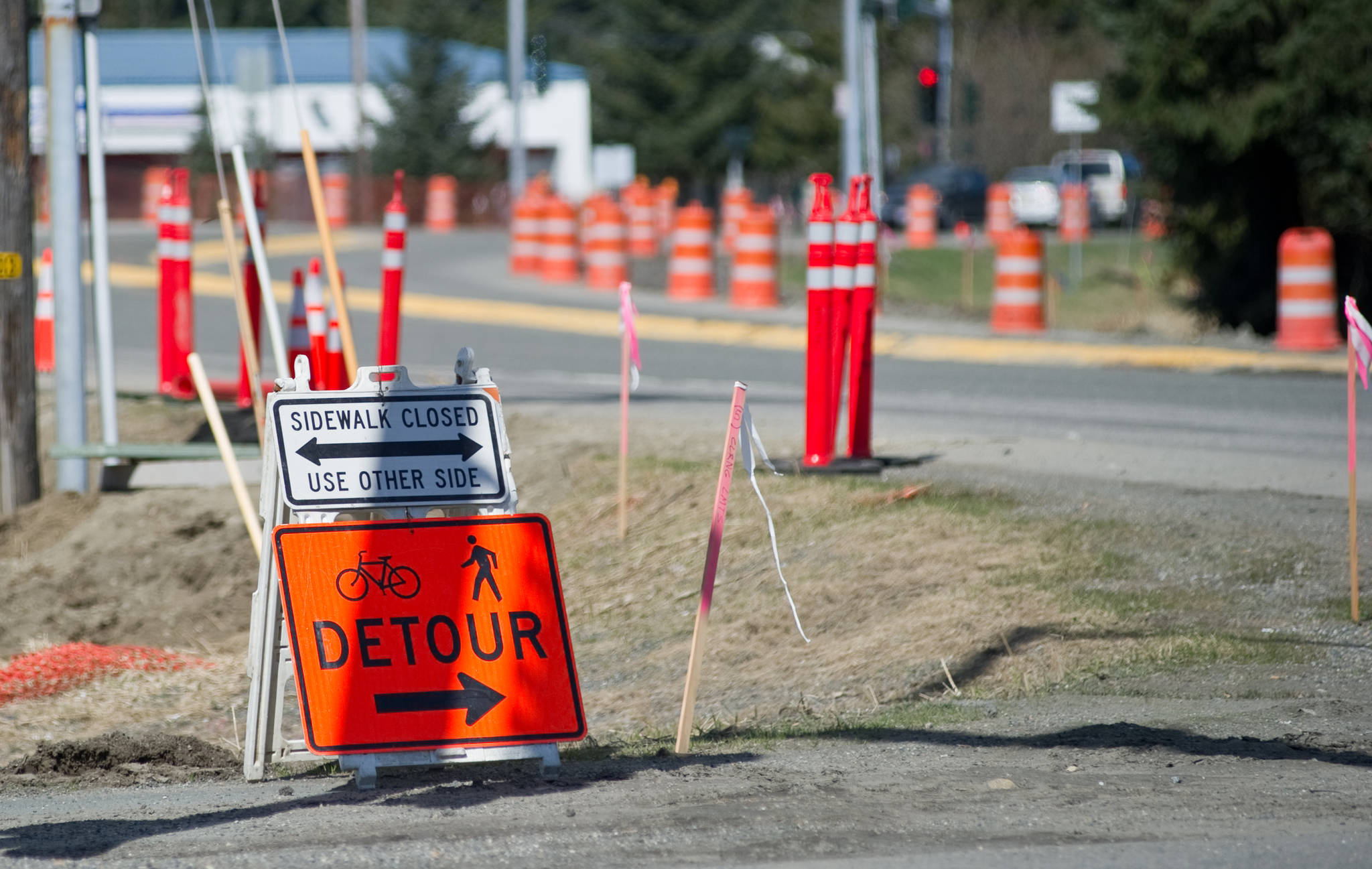 In this May 2014 photo, signs and cones direct traffic at Riverside Drive and Egan Drive. The Alaska Department of Transportation and Public Facilities is planning on repaving Egan Drive between Mendenhall Loop Road and Riverside Drive. (Michael Penn | Juneau Empire)