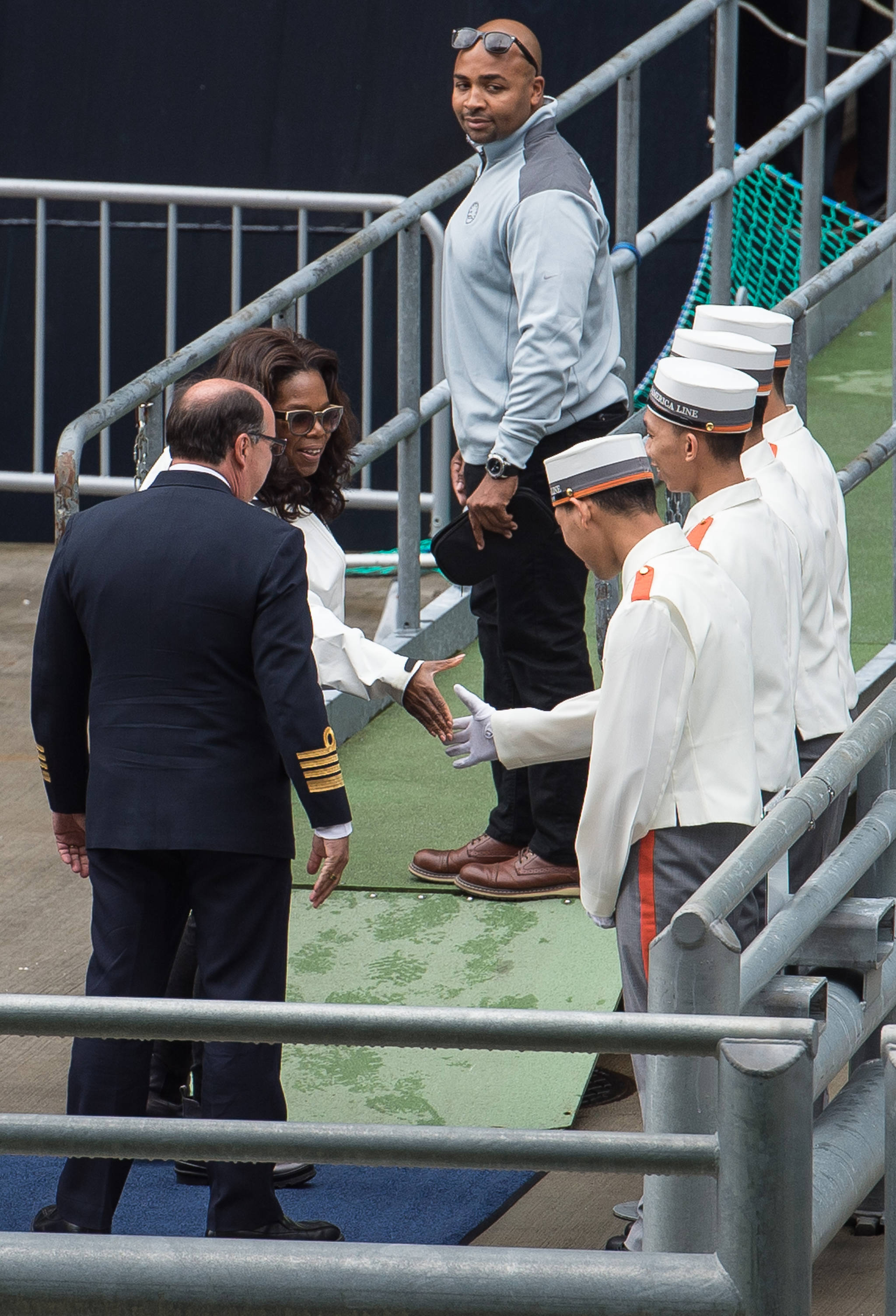 Oprah Winfrey is introduced to staff of Holland America’s Eurodam cruise ship before boarding in Juneau, Alaska, on Monday, July 17, 2017. (Michael Penn | Juneau Empire)