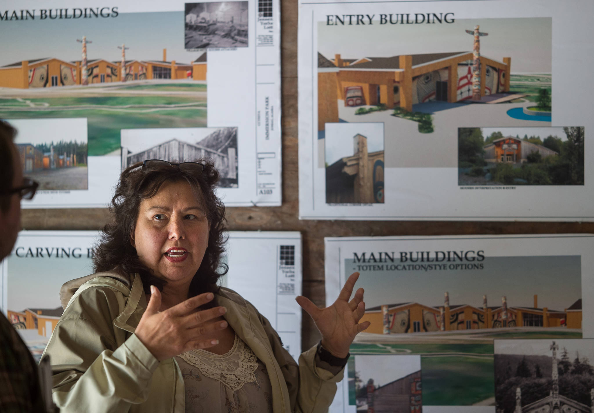 Myrna Gardner, Business and Economic Development Manager for Central Council of the Tlingit and Haida Indian Tribes of Alaska, talks on Tuesday, July 25, 2017, about building designs that will replace the building previously operated as the Thane Ore House near Sheep Creek. (Michael Penn | Juneau Empire)