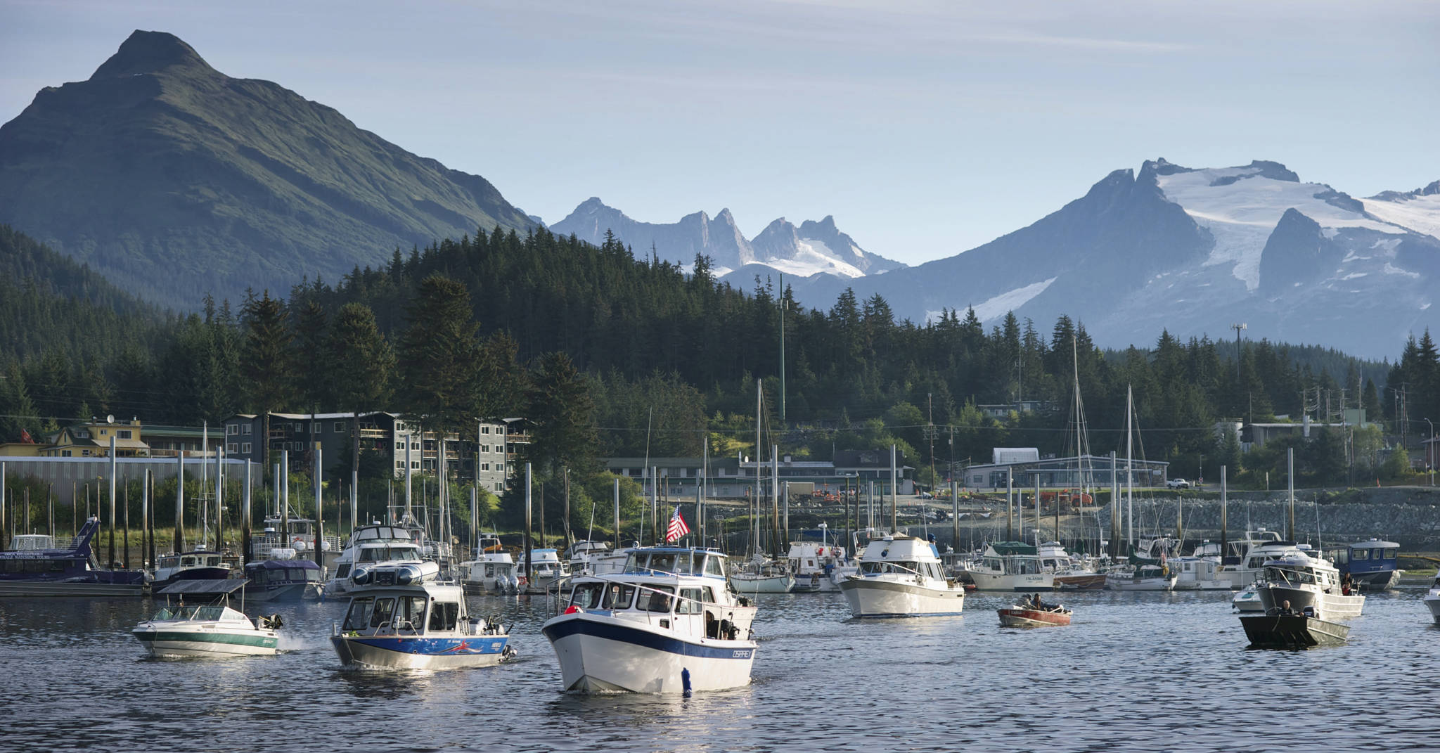 Fishing boats head out of Don Statter Memorial Boat Harbor in 2015. The U.S. Coast Guard is warning Alaskans that new state legislation doesn’t mean Uber for boats. (Michael Penn | Juneau Empire file)