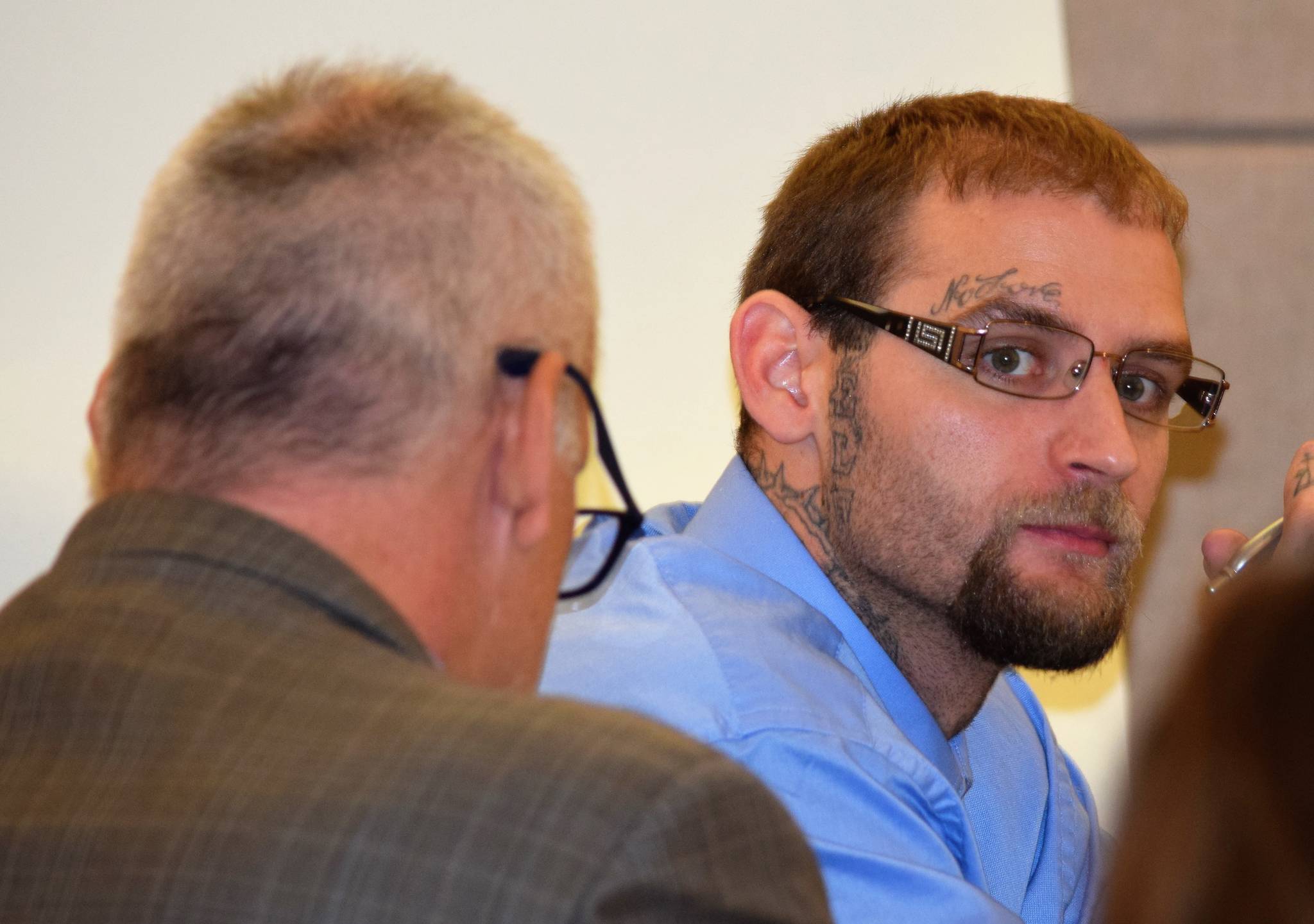 Justin Thomerson and his defense attorney, Gregory Parvin, left, during the third day of Thomerson&rsquo;s trial on riot charges in Juneau Superior Court Thursday morning, Aug. 4, 2017. (Liz Kellar | Juneau Empire)