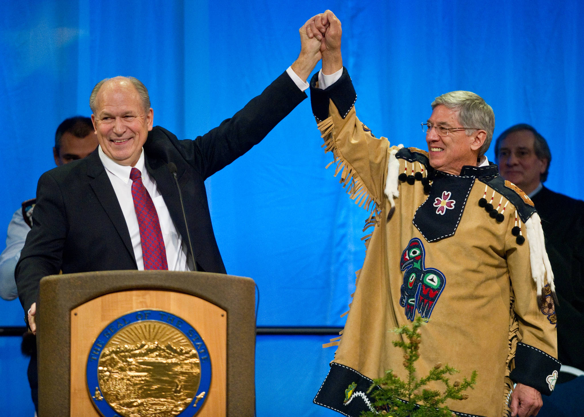 Gov. Bill Walker, left, and Lt. Gov. Byron Mallott are seen at their 2014 inauguration in Centennial Hall. Mallott said Wednesday on KINY-AM that he and Walker are running for re-election in 2018. (Michael Penn | Juneau Empire file)