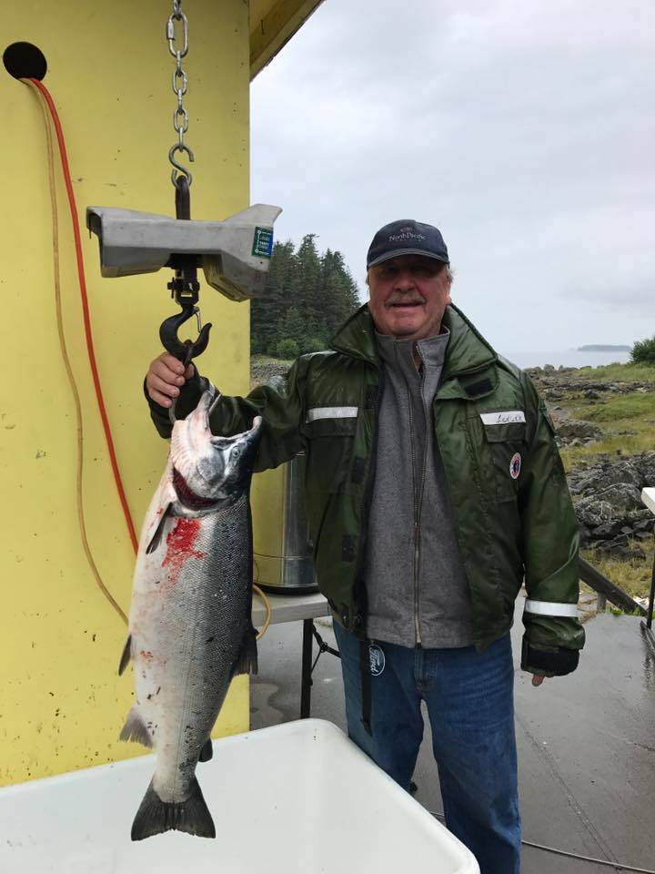 Golden North Salmon Derby winner Don Zenger poses at Amalga Harbor with his 18.8-pound, Derby-winning coho salmon on Aug. 12, 2017. (Courtesy Don Zenger)