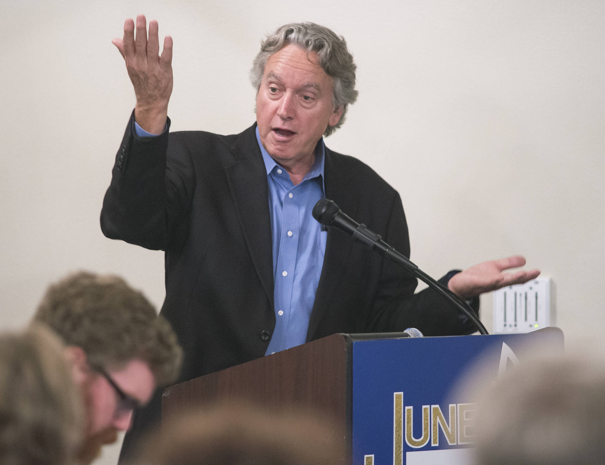Mark Lautman, author of “When the Boomers Bail: A Community Economic Survival Guide”, speaks to a full house at the Juneau Chamber of Commerce luncheon at the Moose Lodge on Thursday, Aug. 17, 2017. (Michael Penn | Juneau Empire)