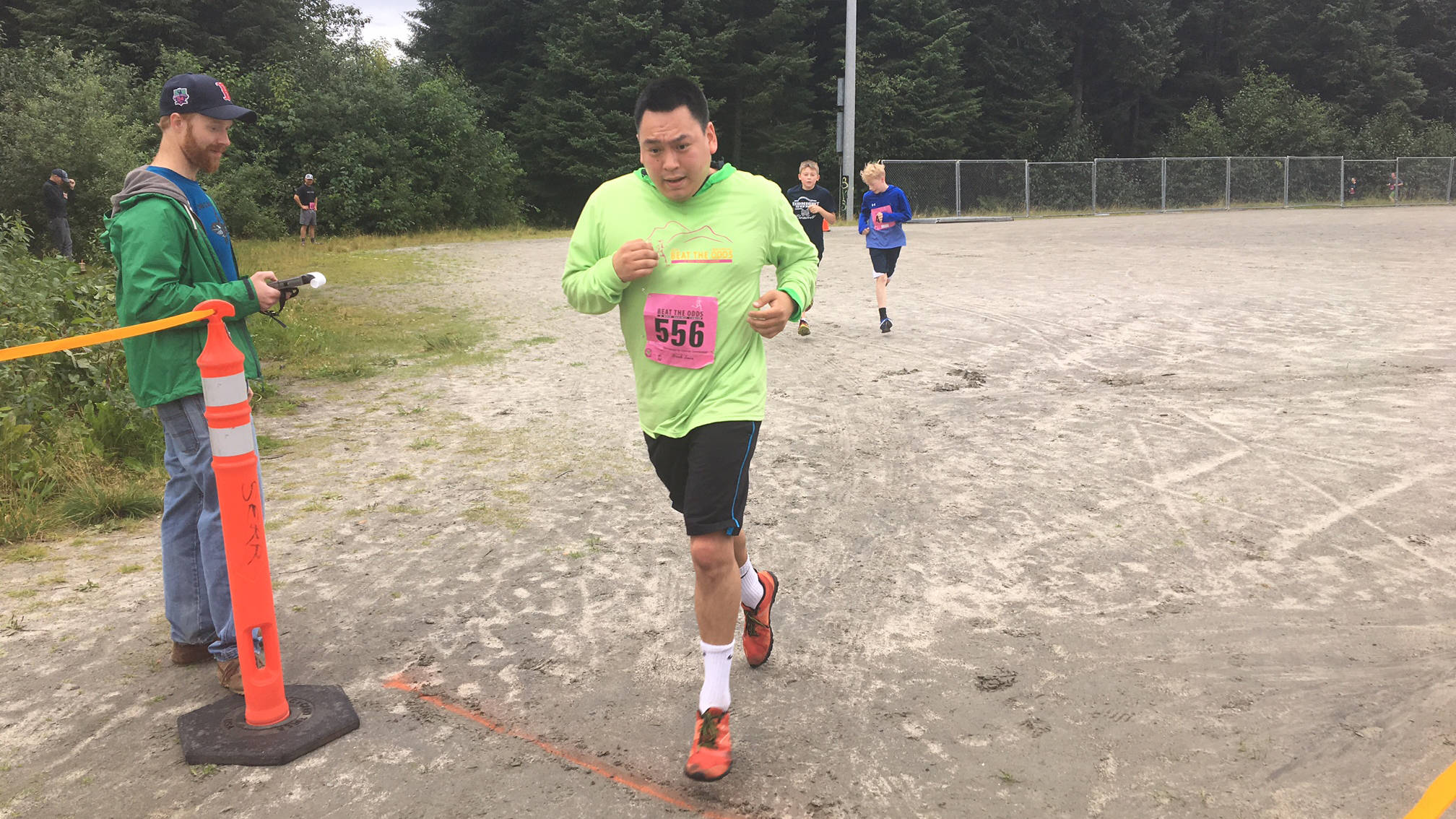 A Beat the Odds racer finishes Saturday outside Riverbend Elementary School. (Photo courtesy of the Cancer Connection)