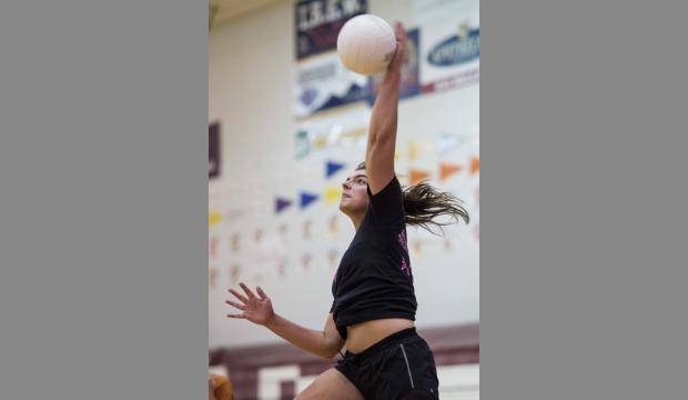 Juneau-Douglas High School volleyball player Leah Spargo practices on Aug. 23, 2017. (Michael Penn | Juneau Empire.
