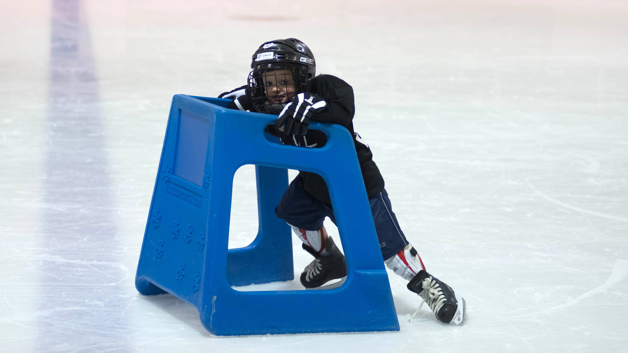 A young boy learns to skate at last year’s Discover Hockey Day at Treadwell Ice Arena. (Photo courtesy of Steve Quinn)