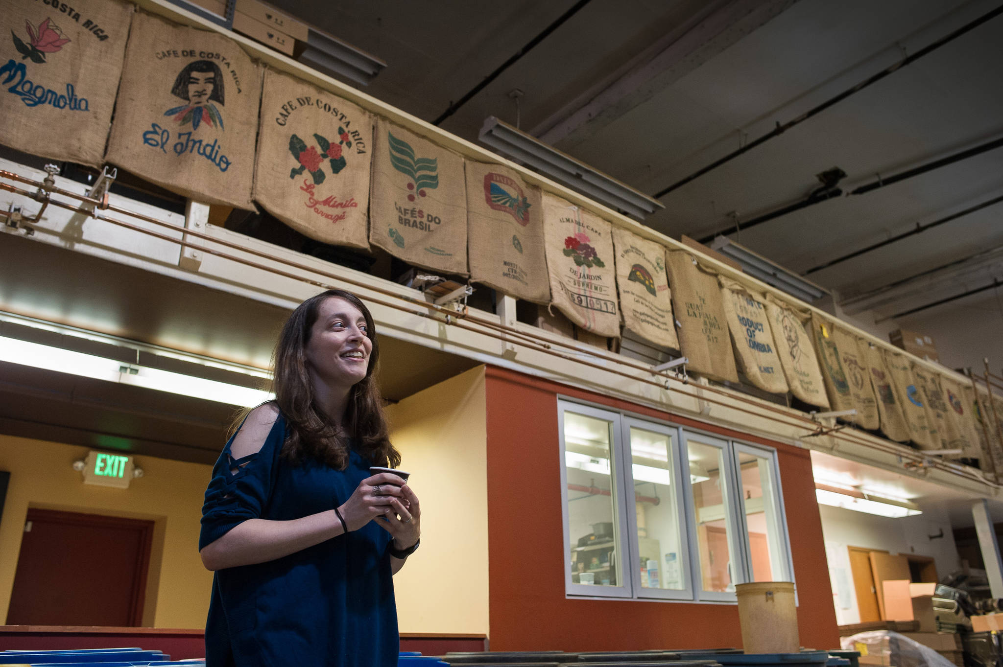 Amy Knight talks about her new ownership of Heritage Coffee at their downtown office and roasting facility on Thursday, Aug. 31, 2017. (Michael Penn | Juneau Empire)