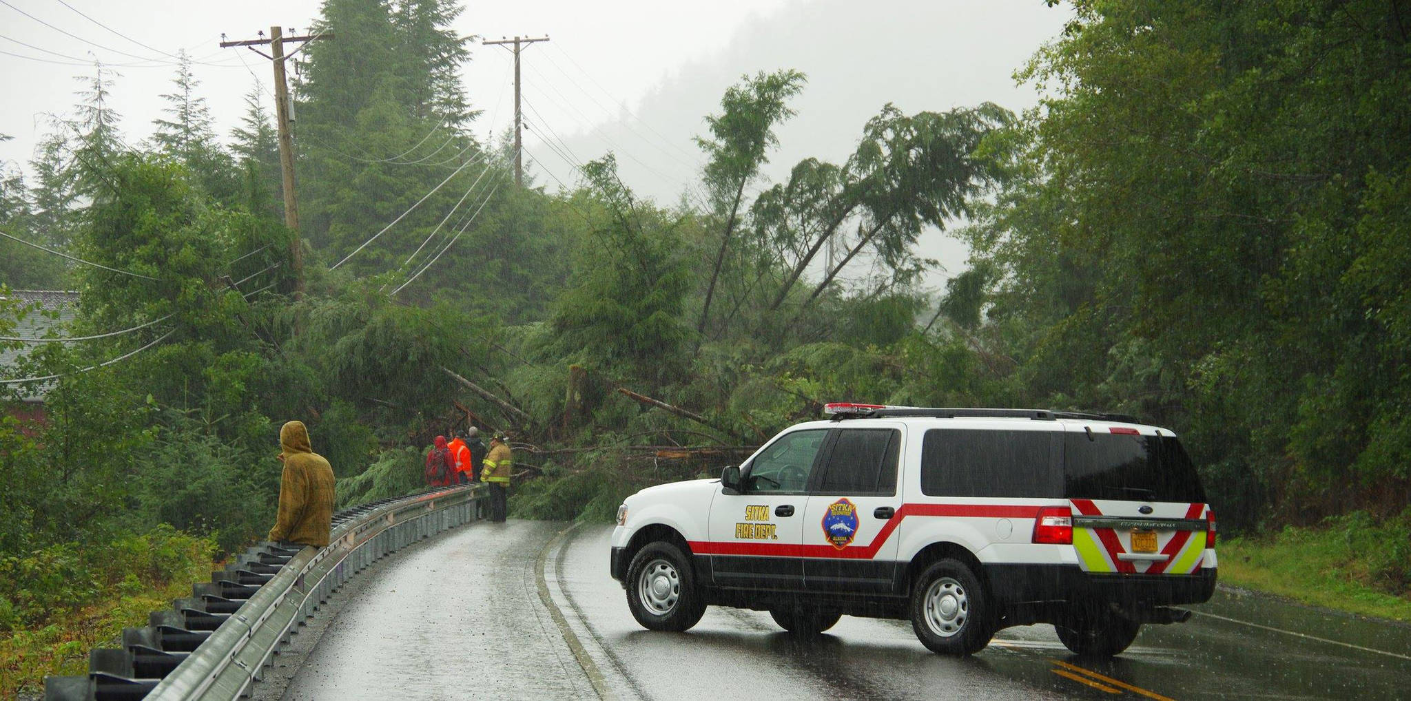 A landslide blocks Sitka’s Halibut Point Road on Monday. No one was injured in the slide, the city’s worst in two years, and one home suffered superficial damage.  ^ Roberta White | Sitka Fire Department