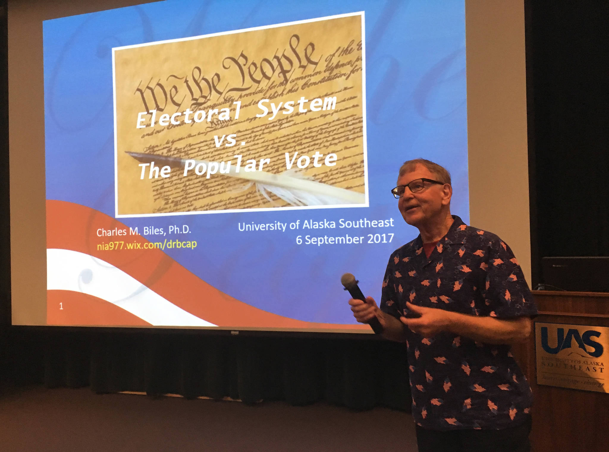 Charles Biles of Humboldt State University presents a lecture at the University of Alaska Southeast on Wednesday night, Sept. 7, 2017. (James Brooks | Juneau Empire)