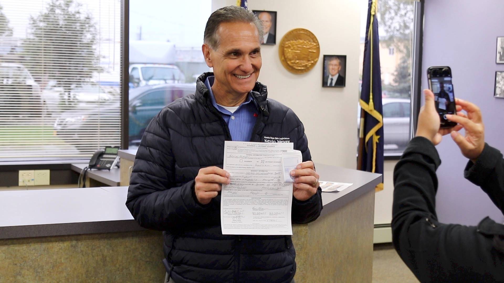 Sen. Kevin Meyer, R-Anchorage, poses for a photograph at the Anchorage office of the Alaska Division of Elections as he files to run for lieutenant governor. (Campaign of Kevin Meyer photo)