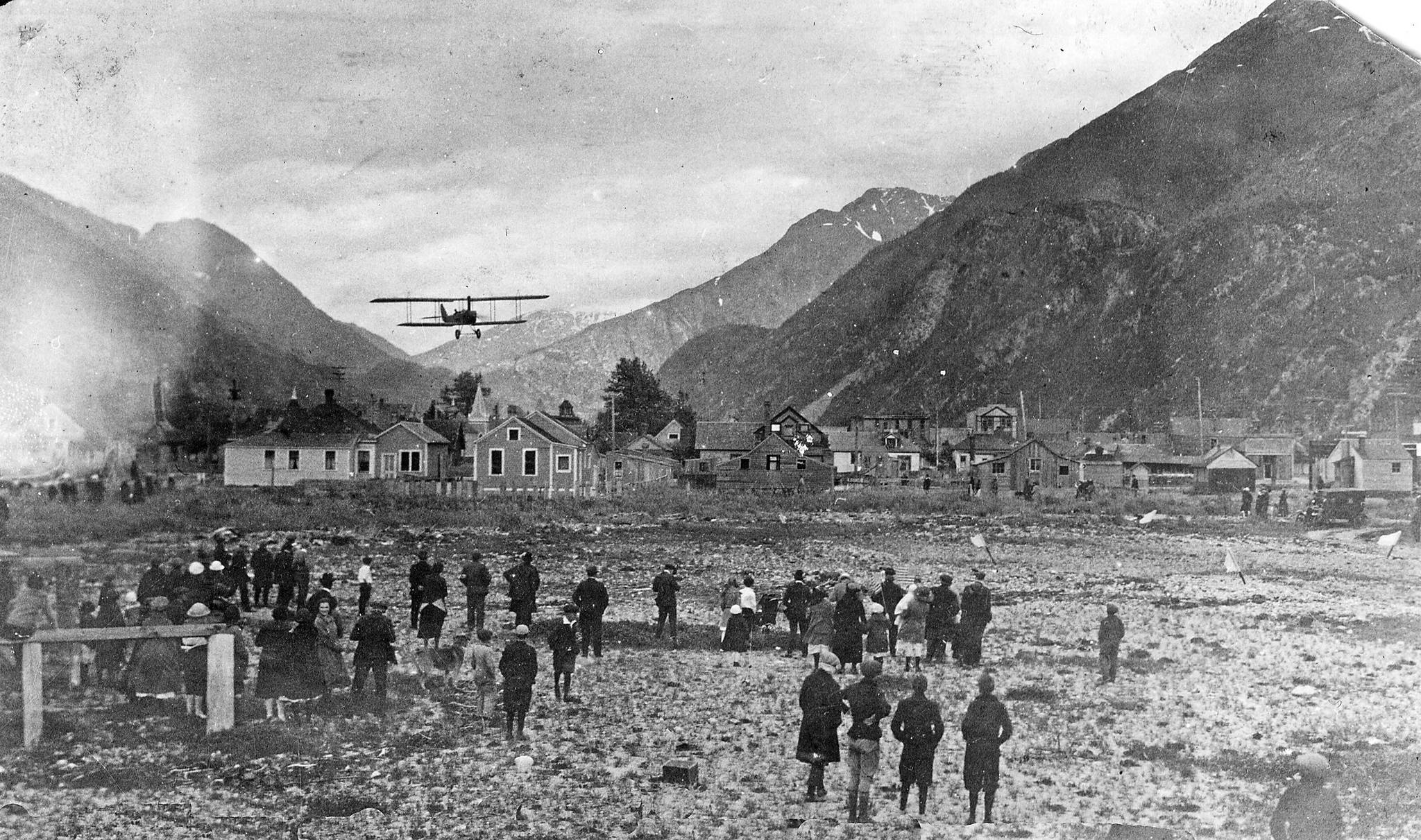 Clearance Oliver Prest’s first landing of an airplane on the Skagway beach on July 6, 1922. Image courtesy of the National Park Service, Klondike Gold Rush National Historical Park, Candy Waugaman Collection, KLGO TA-8-8917.