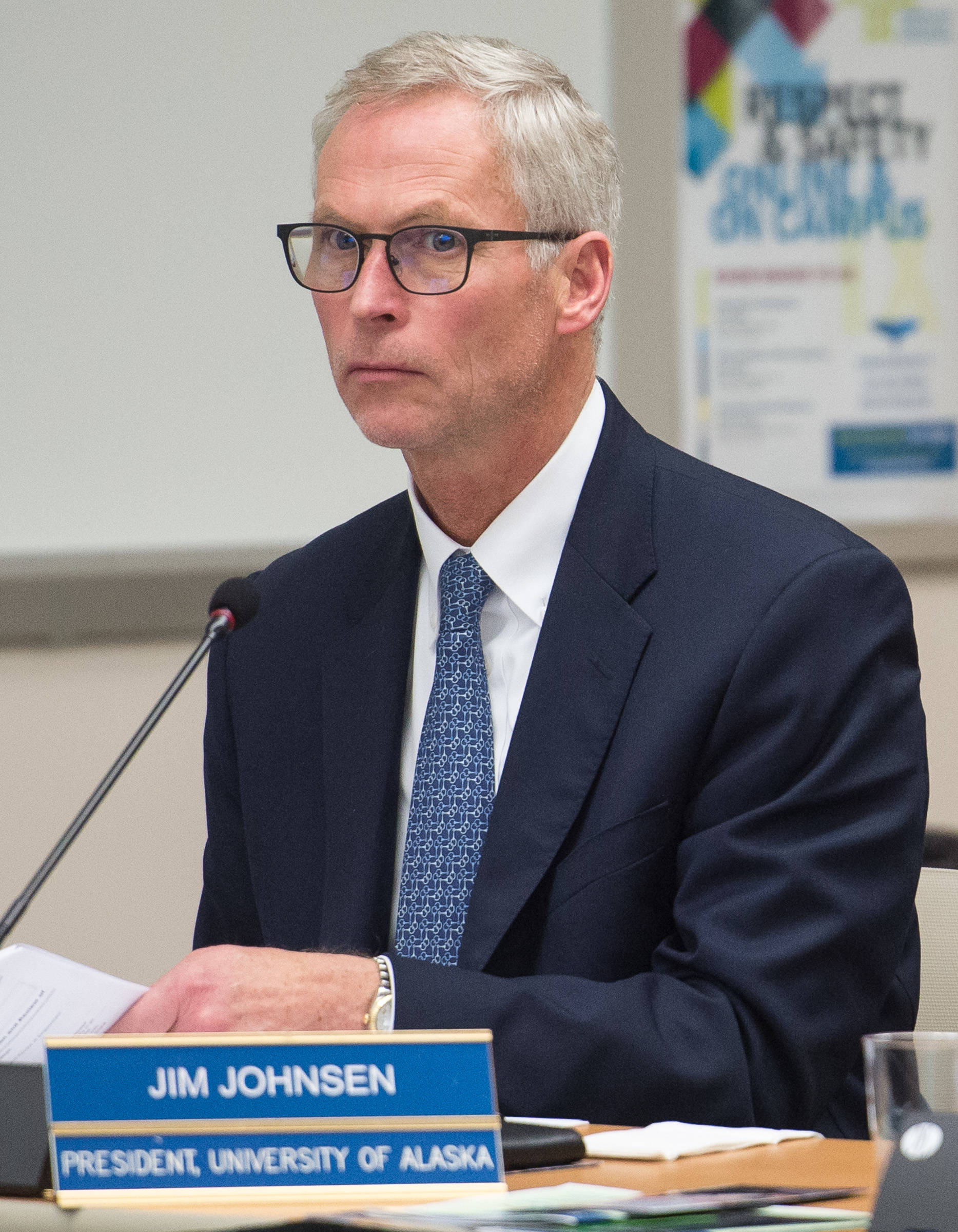 University of Alaska President Jim Johnsen watches Board of Regents vote on his bonus pay during their meeting at the University of Alaska Southeast Student Recreation Center on Thursday, Sept. 14, 2017. (Michael Penn | Juneau Empire)