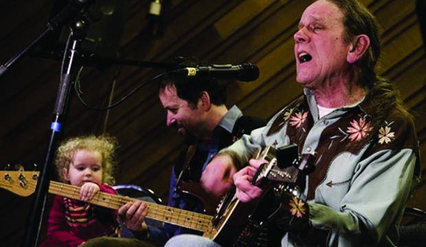 Buddy Tabor performs at Resurrection Lutheran Church in January 2009. Albert McDonnell and his daughter Hazel are shown at left. (Juneau Empire File)