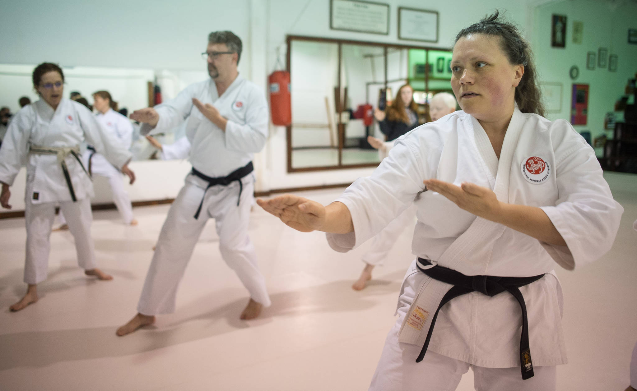 Maraiya Gentili, right, drills under instructor Diana Stevens, left, at Juneau Shotokan Karate on Thursday, Oct. 5, 2017. Gentili was recently awarded her second degree black belt. (Michael Penn | Juneau Empire)
