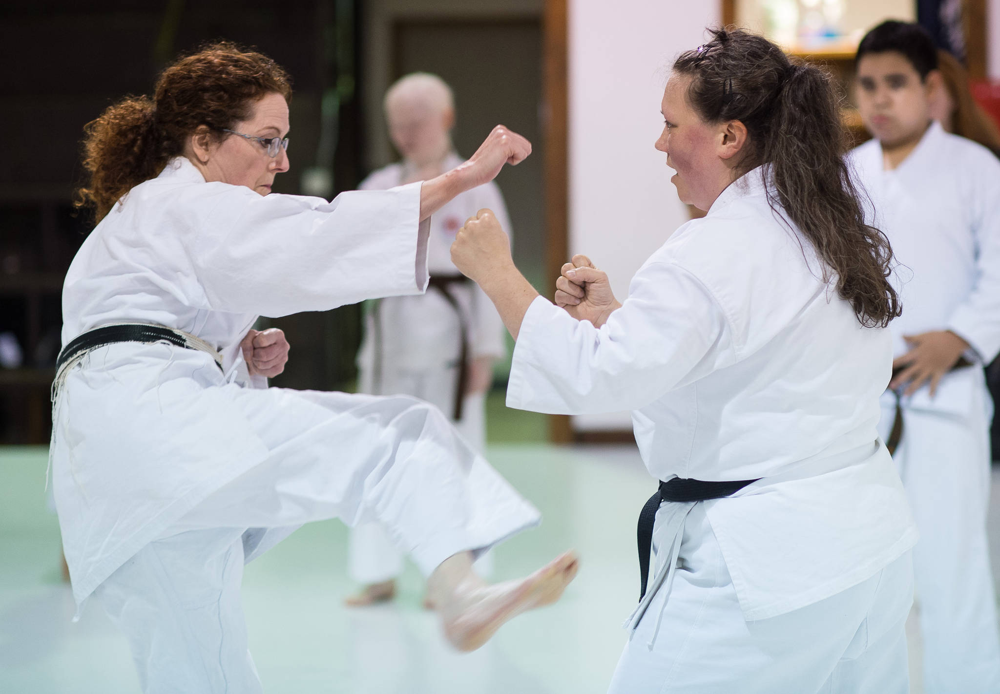 Maraiya Gentili, right, drills with instructor Diana Stevens at Juneau Shotokan Karate on Thursday, Oct. 5, 2017. Gentili was recently awarded her second degree black belt. (Michael Penn | Juneau Empire)