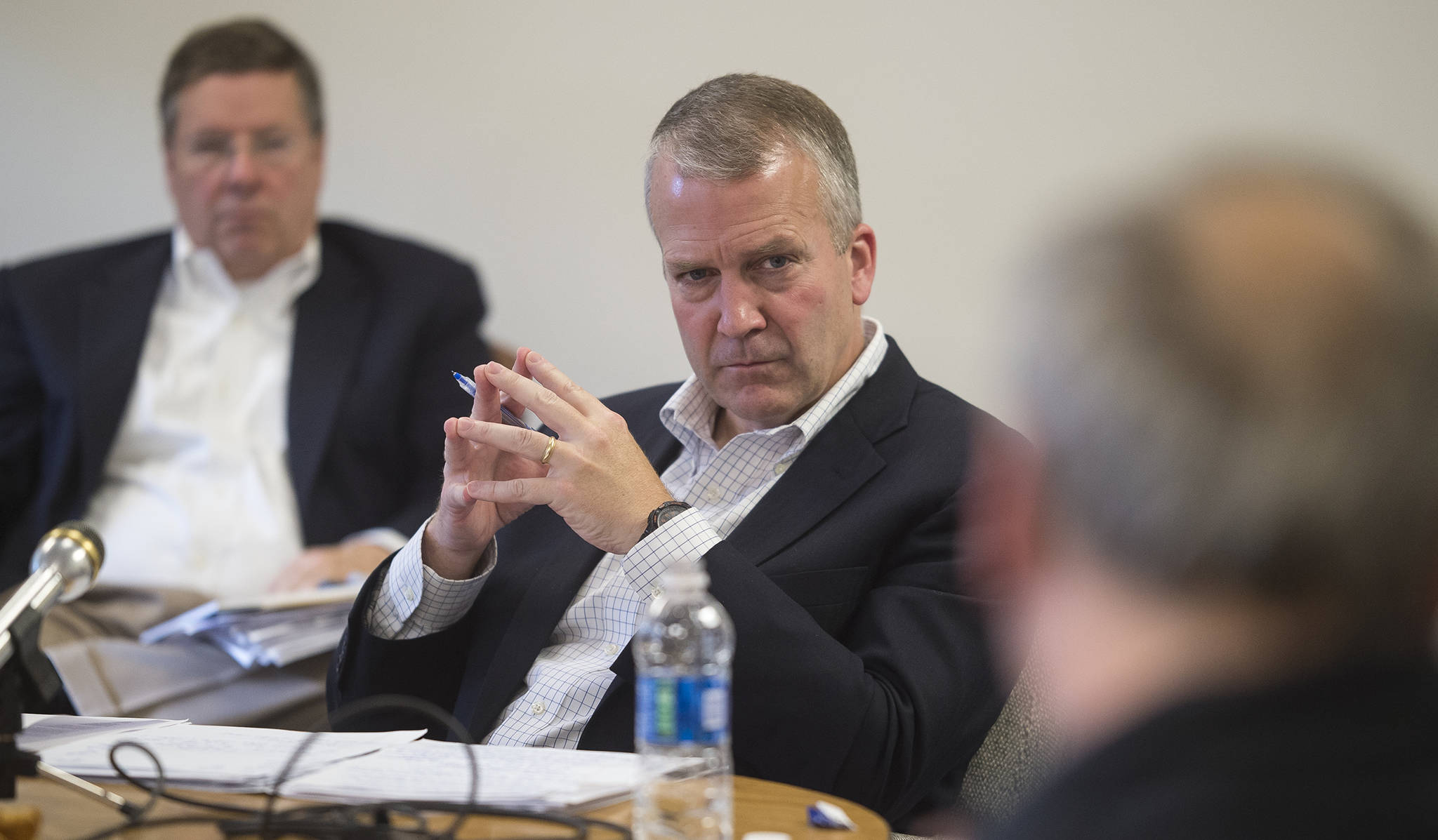 U.S. Sen. Dan Sullivan, R-Alaska, listens to comments about improving the nation&rsquo;s tax code as he holds a meeting with local business owners at the Juneau Chamber of Commerce&rsquo;s office on Monday, Oct. 9, 2017. (Michael Penn | Juneau Empire)