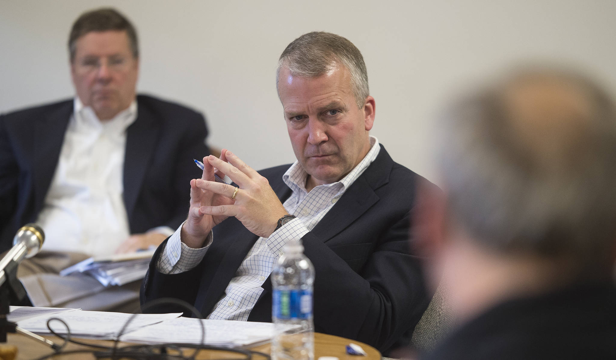 U.S. Sen. Dan Sullivan, R-Alaska, listens to comments about improving the nation’s tax code as he holds a meeting with local business owners at the Juneau Chamber of Commerce’s office on Monday, Oct. 9, 2017. (Michael Penn | Juneau Empire)
