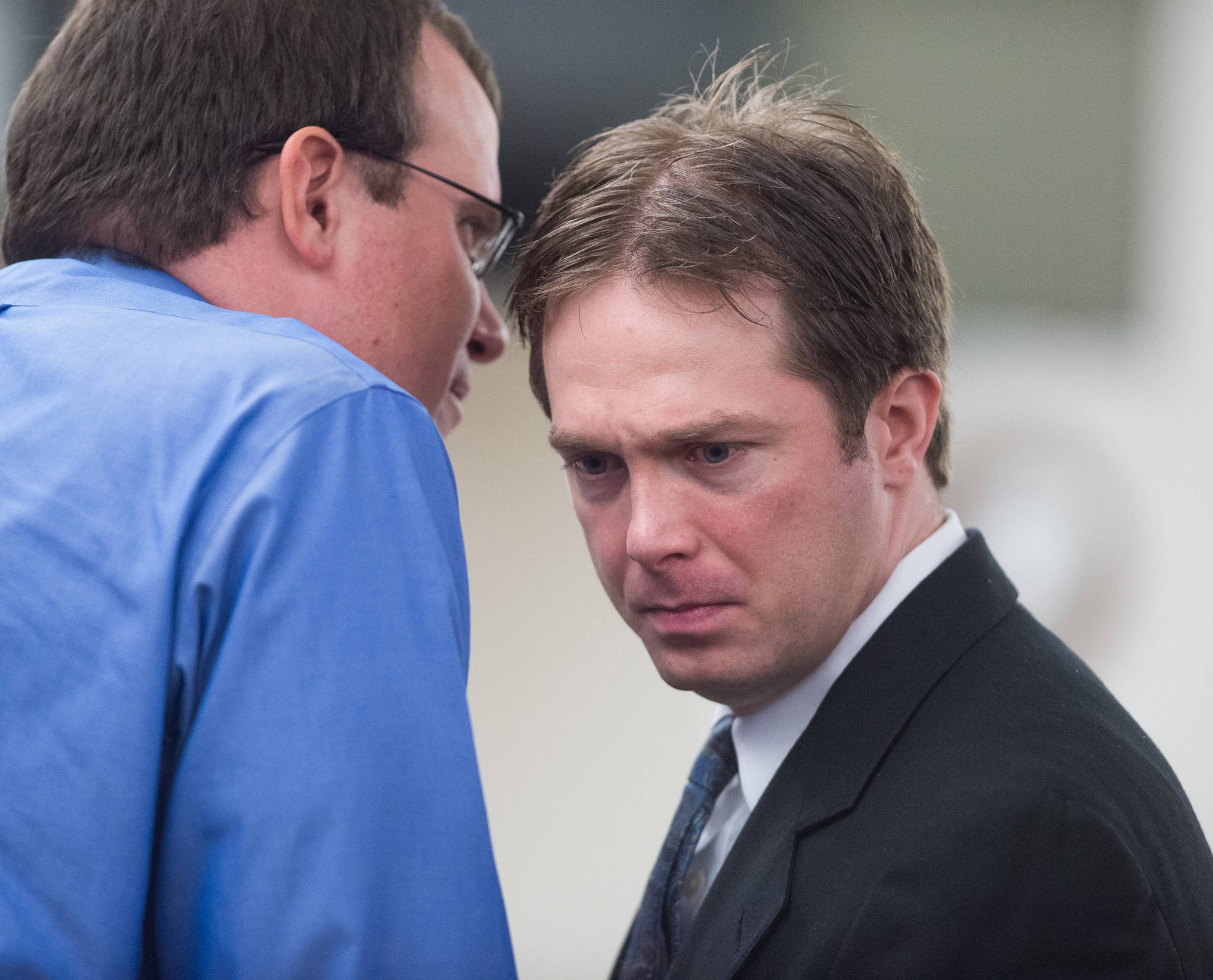Christopher Strawn, right, confers with criminal defense attorney Nicholas Polasky during his trial in Juneau Superior Court on Monday, Oct. 9, 2017. Strawn, 34, faces charges of first-degree and second-degree murder, manslaughter, criminally negligent homicide, third-degree assault and weapons misconduct in the shooting death of Brandon Cook in October 2015. (Michael Penn | Juneau Empire)