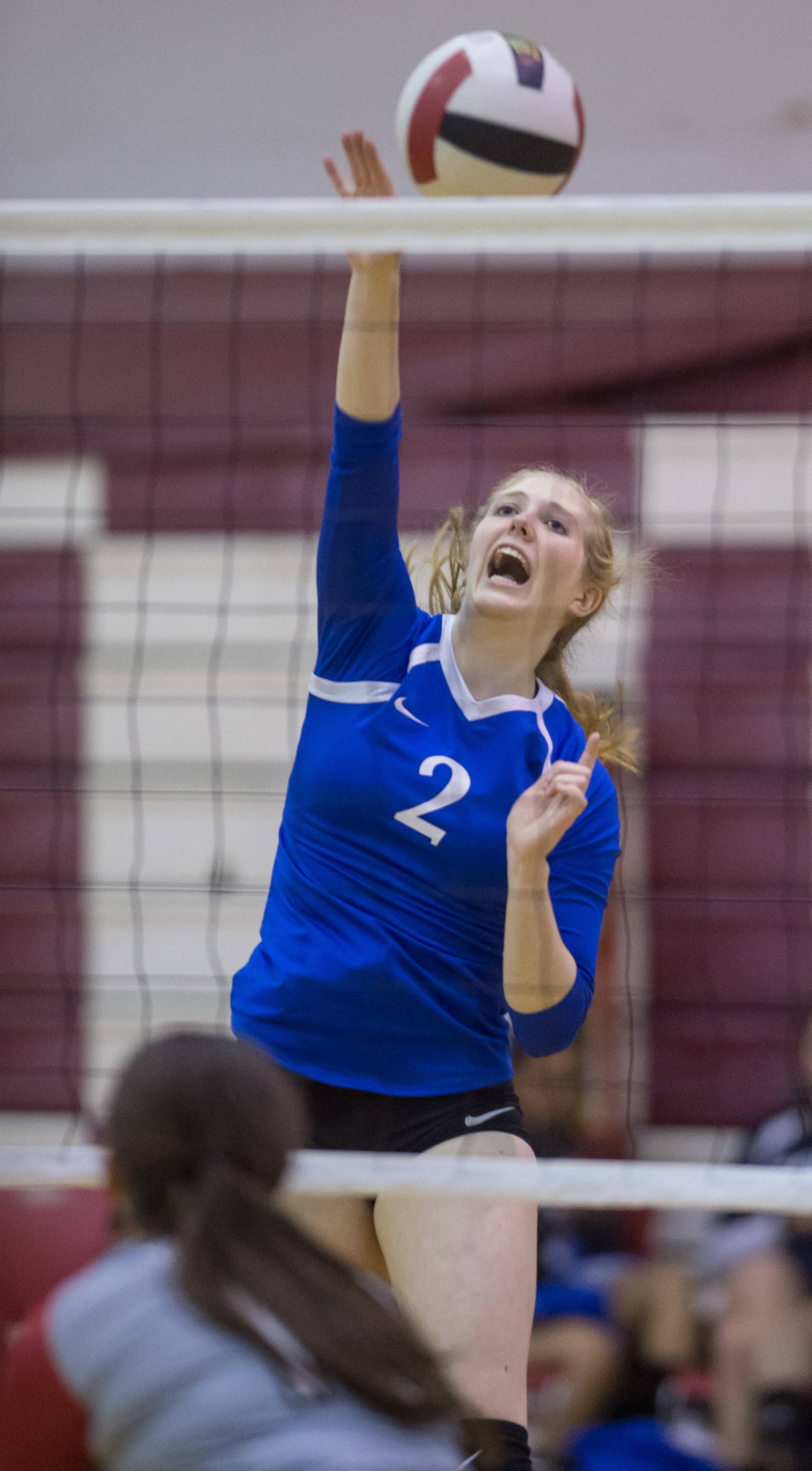 Thunder Mountain’s Mary Landes spikes against Wrangell at the Juneau Invitational Volleyball Extravaganza at JDHS on Friday, Oct. 13, 2017.