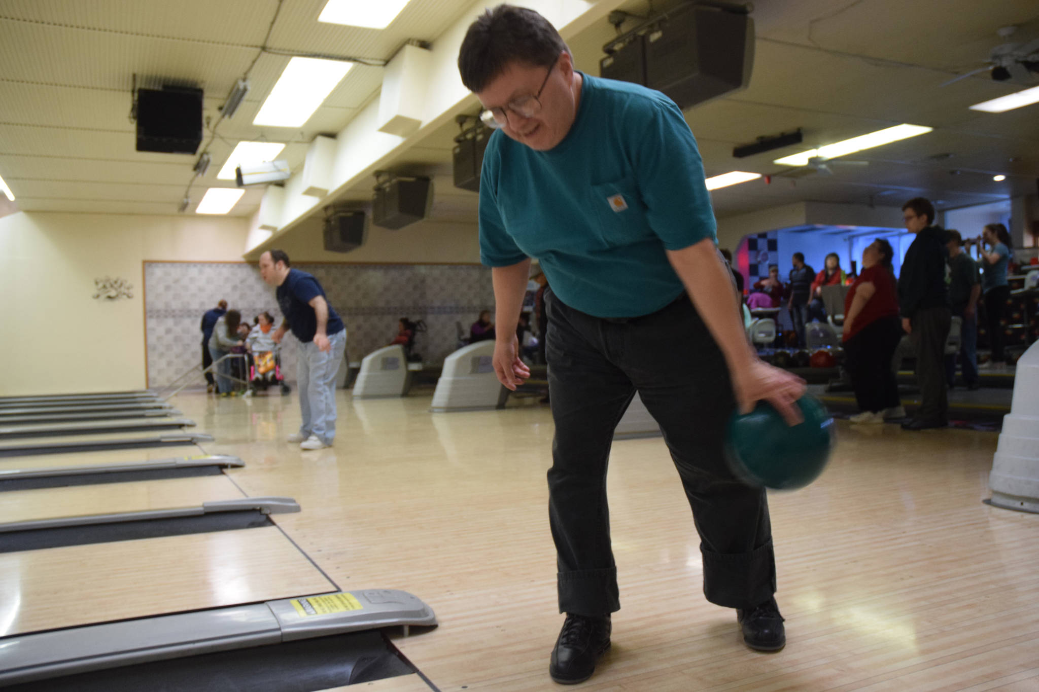 Special Olympics athletes take their turns bowling at a practice at Taku Lanes on Sunday, Oct. 15. (Kevin Gullufsen | Juneau Empire)