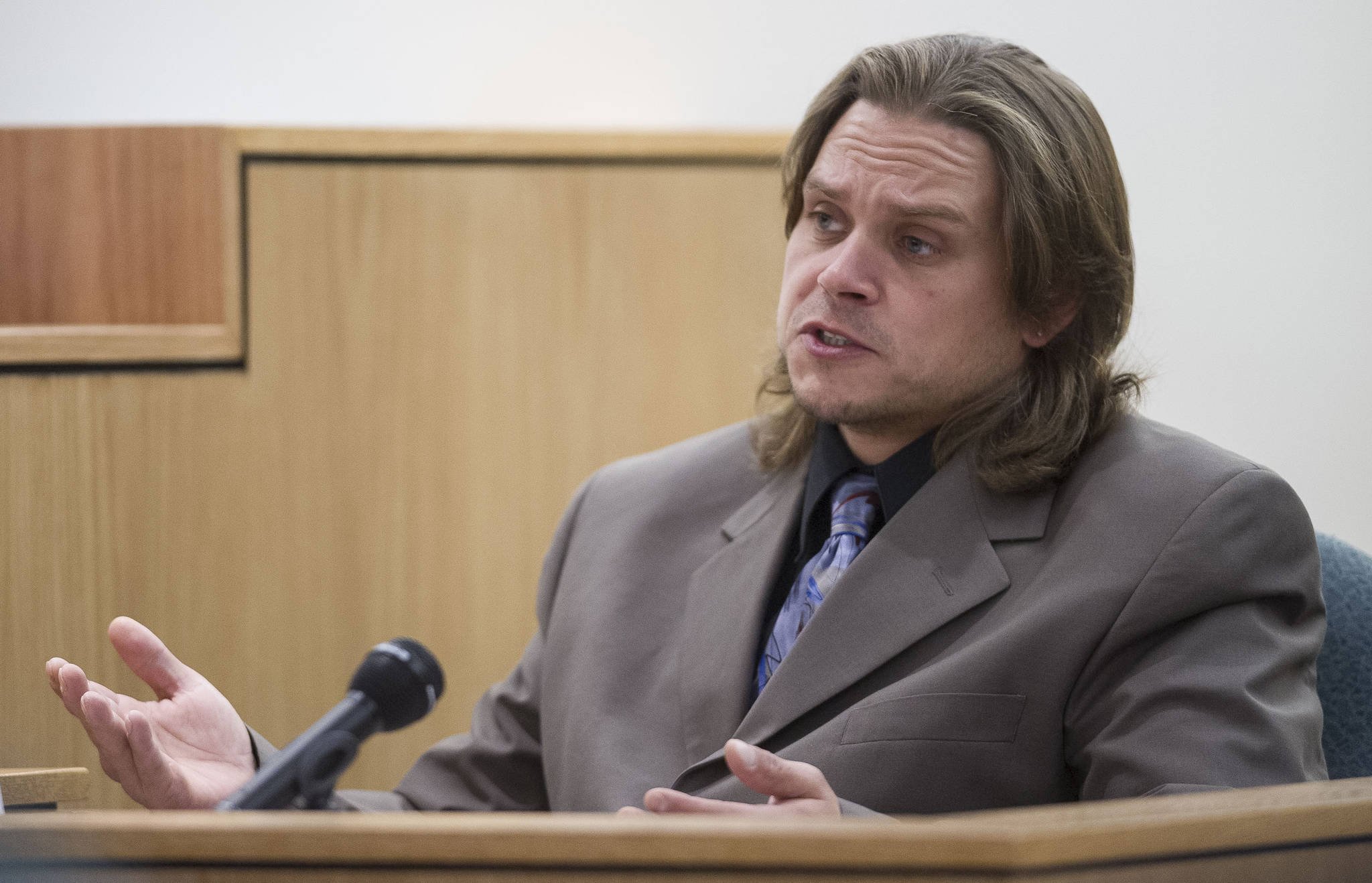 Tim Shockley, a resident of the Kodzoff Acres Mobile Home Park, answers questions by Christopher Strawn during Strawn’s trial in Juneau Superior Court on Tuesday, Oct. 17, 2017. Strawn, 34, faces charges of first-degree and second-degree murder, manslaughter, criminally negligent homicide, third-degree assault and weapons misconduct in the shooting death of Brandon Cook in October 2015. (Michael Penn | Juneau Empire)