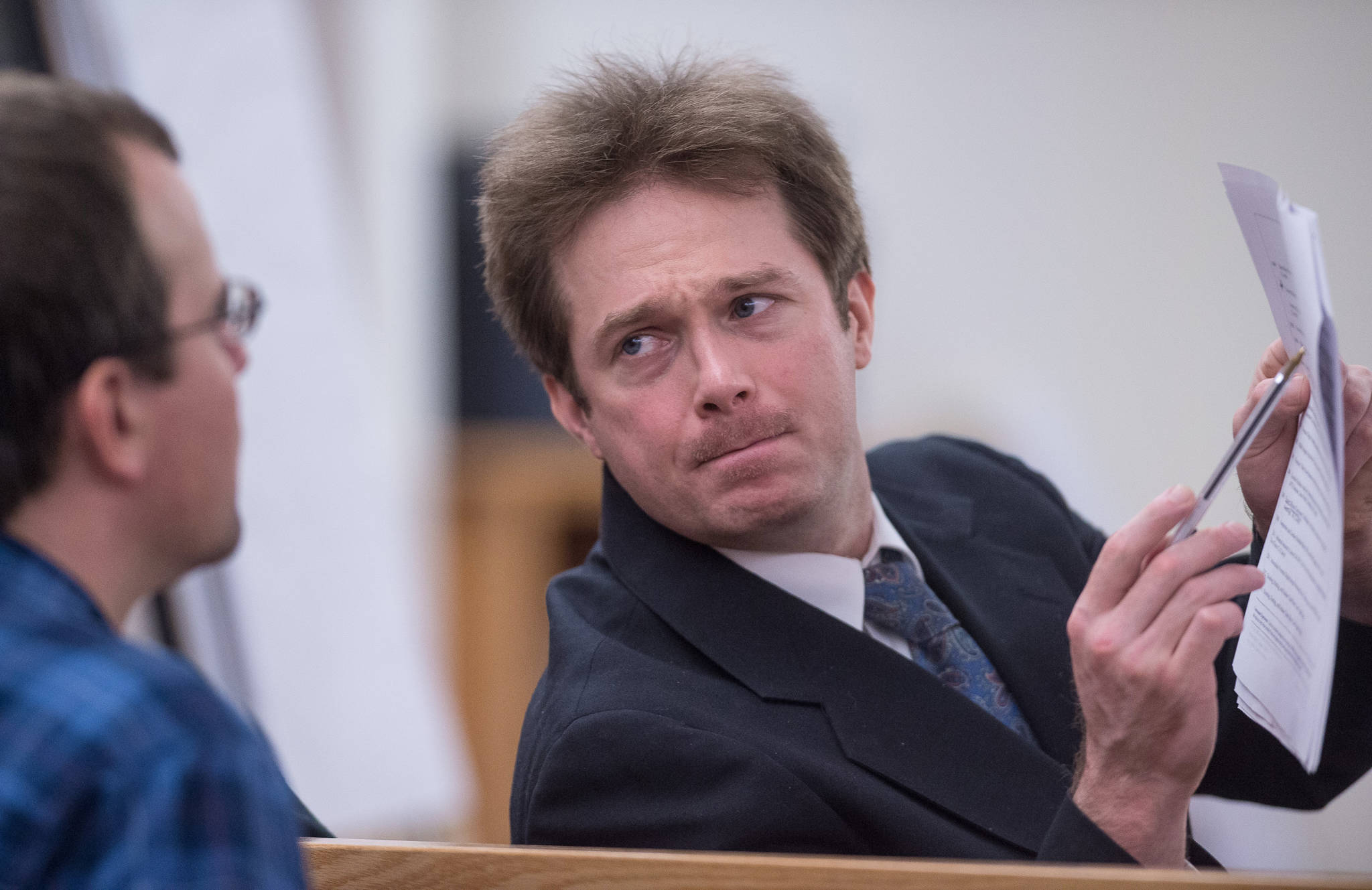 Christopher Strawn, right, confers with criminal defense attorney Nicholas Polasky during his trial in Juneau Superior Court on Friday, Oct. 13, 2017. Strawn, 34, faces charges of first-degree and second-degree murder, manslaughter, criminally negligent homicide, third-degree assault and weapons misconduct in the shooting death of Brandon Cook in October 2015. (Michael Penn | Juneau Empire)