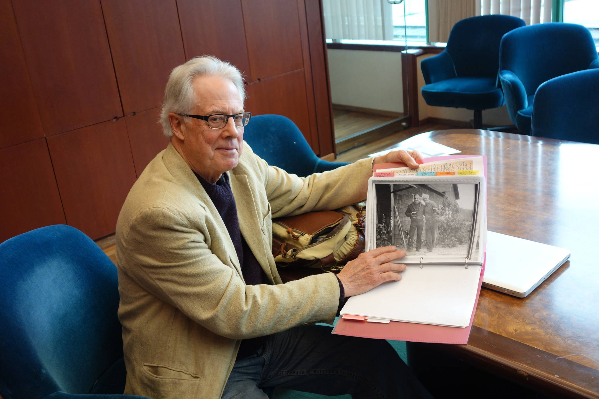 Joel Bennett with his folder of research he gathered from which he based the play “Dreaming Glacier Bay.” Clara Miller | Capital City Weekly.