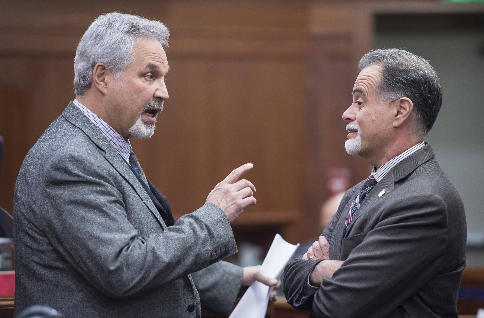 Senate President Pete Kelly, R-Fairbanks, left, and Senate Majority Leader Peter Micciche, R-Soldotna, speak before gaveling in on the first day of the fourth Special Session of the 30th Alaska Legisture on Monday, Oct. 23, 2017. (Michael Penn | Juneau Empire)