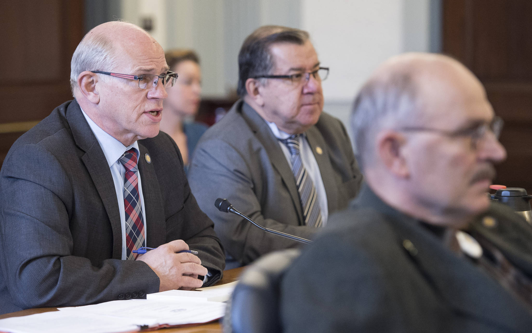 Sen. John Coghill, R-North Pole, left, Sen. Lyman Hoffman, D-Bethel, center, and Sen. Click Bishop, Fairbanks, question Commissioner of the Department of Corrections Dean Williams in Senate Finance Committee at the Capitol on Tuesday, Oct. 24, 2017. (Michael Penn | Juneau Empire)