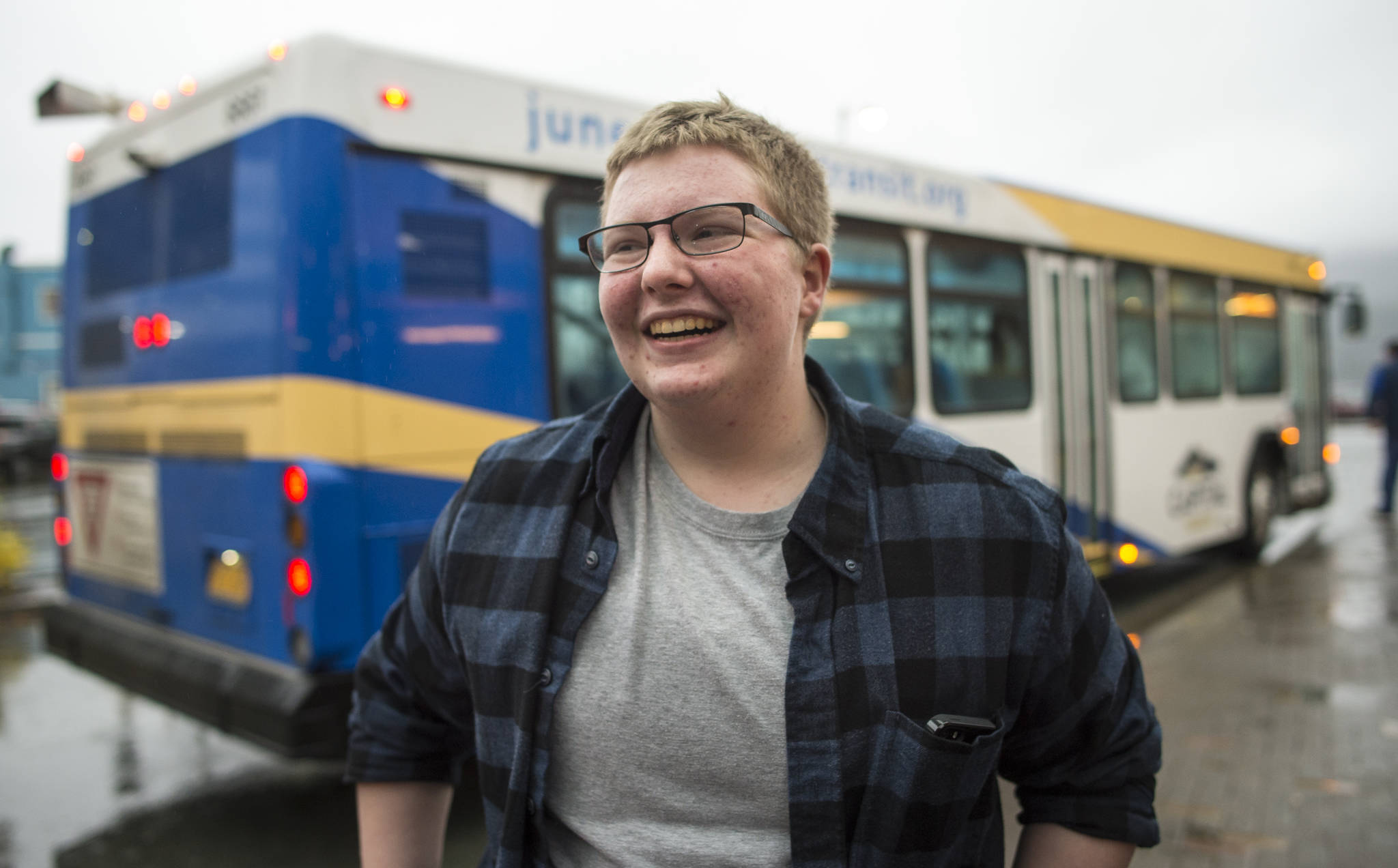 Ben Miller, 17, is fascinated with every aspect of the Capital Transit buses. (Michael Penn | Juneau Empire)