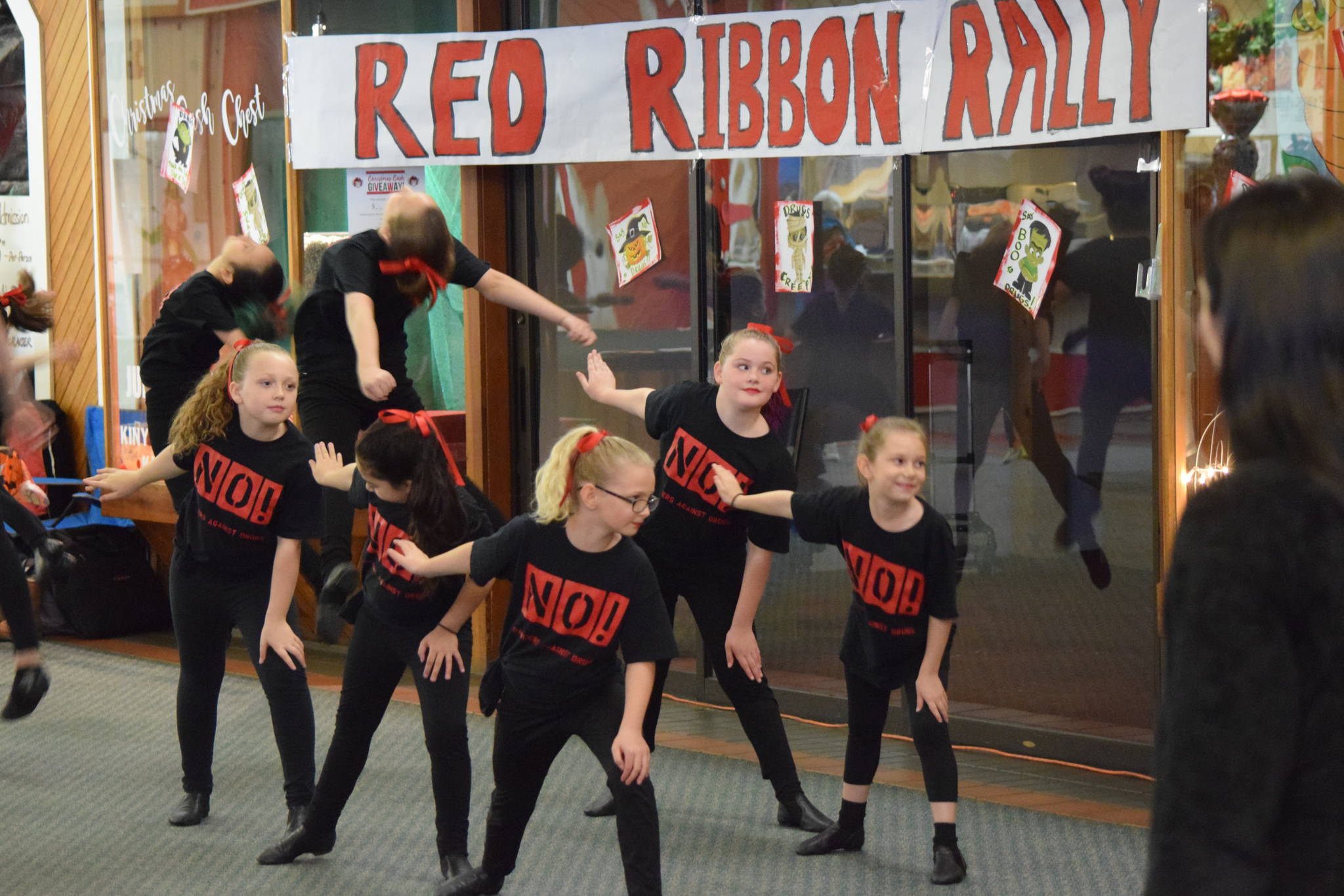 Fusion Dance Company dancers, ages 7-15, perform at the Red Ribbon Rally, an annual anti-drug event at the Nugget Mall. (Kevin Gullufsen | Juneau Empire)