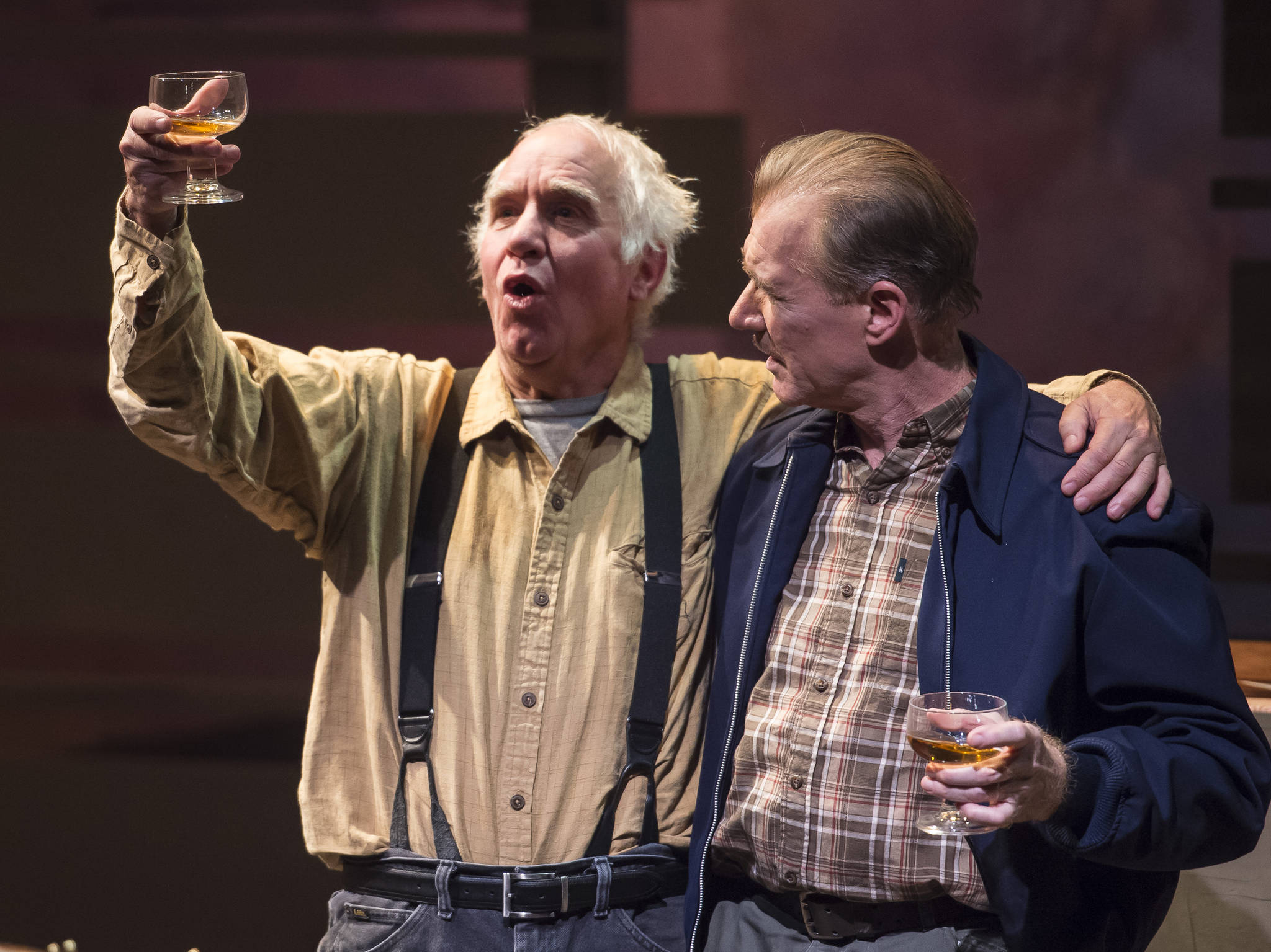 John Barrymore, played by Peter DeLaurier, right, and Joe, played by Mike Peterson,share a drink during Perseverance Theatre’s production of Joel Bennett’s “Dreaming Glacier Bay” on Tuesday, Oct. 25, 2017. (Michael Penn | Capital City Weekly)