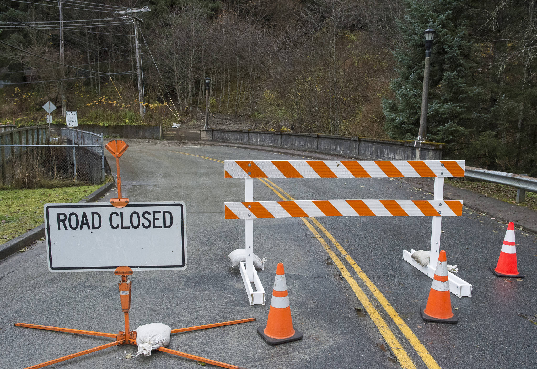 The Calhoun Avenue Bridge of Gold Creek remains closed on Monday, Oct. 30, 2017, so state inspectors can check for damage after Friday’s storm. (Michael Penn | Juneau Empire)