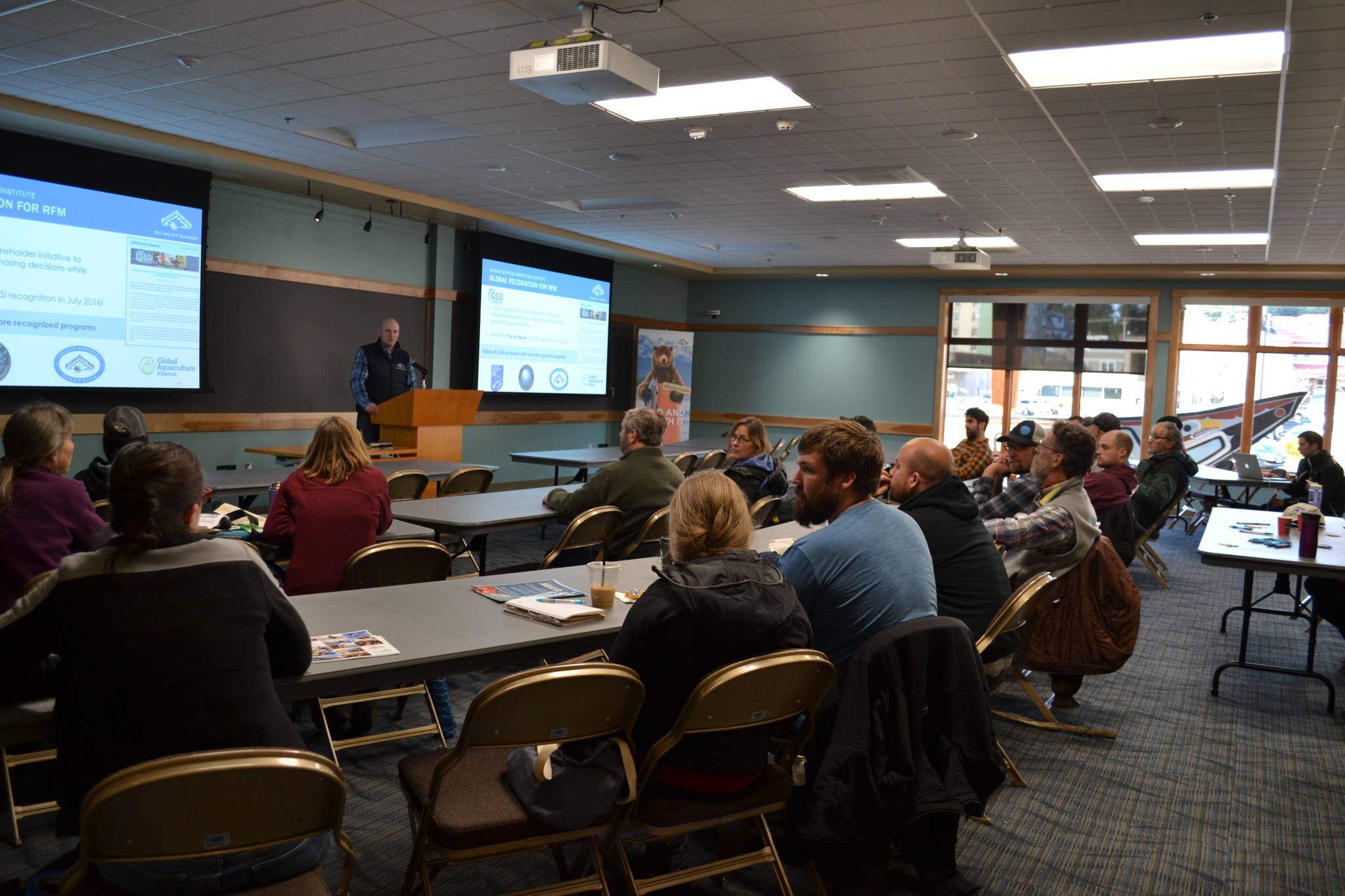 Jeremy Woodrow of ASMI gives a presentation about Alaska seafood marketing trends and updates at Harrigan Centennial Hall at the Sitka Fall Fishermen’s Expo. (Photo by Alyssa Russell, ALFA)